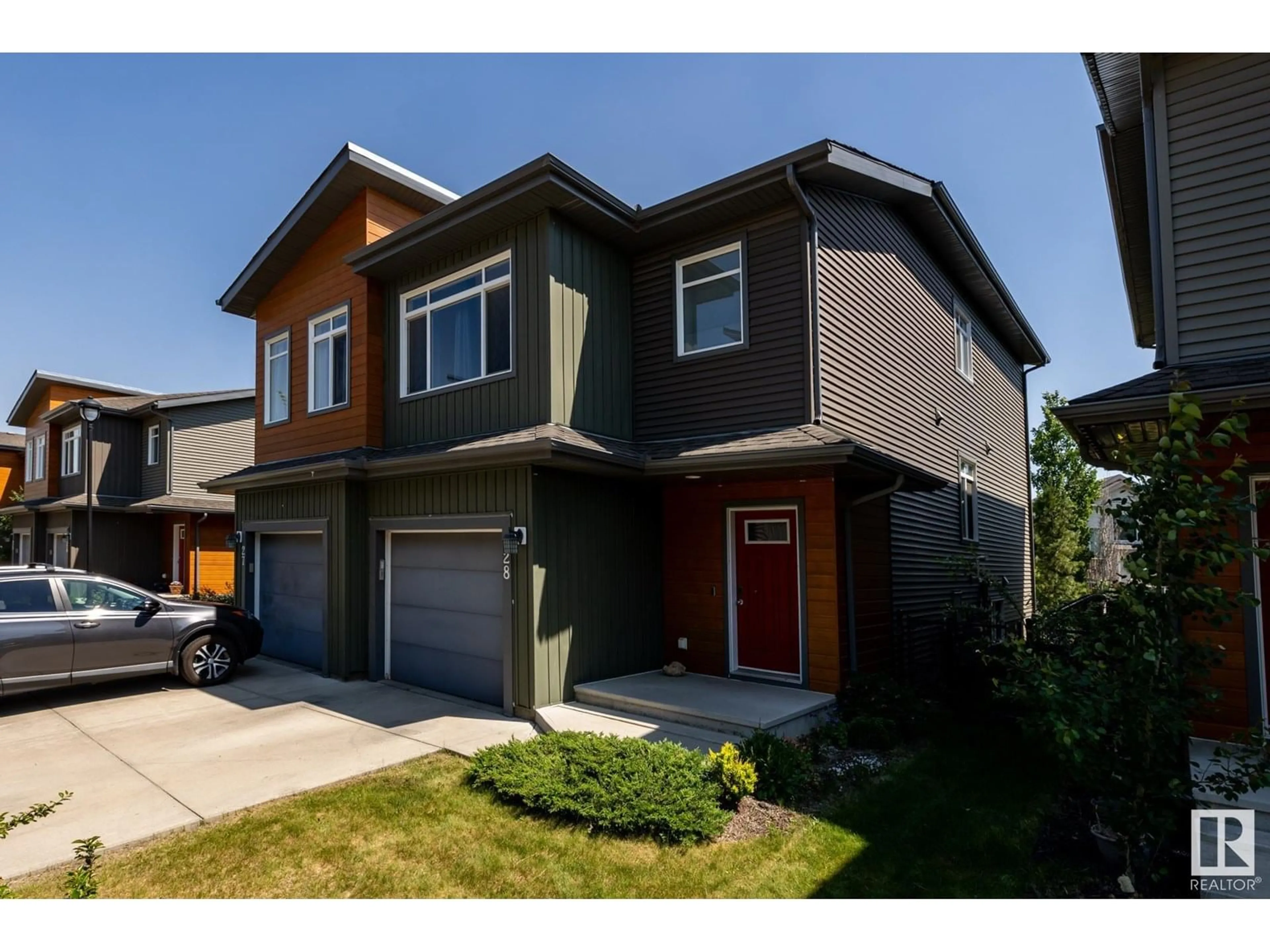 Home with vinyl exterior material, street for 28 - 7503 GETTY GATE GA, Edmonton Alberta T5T4S8