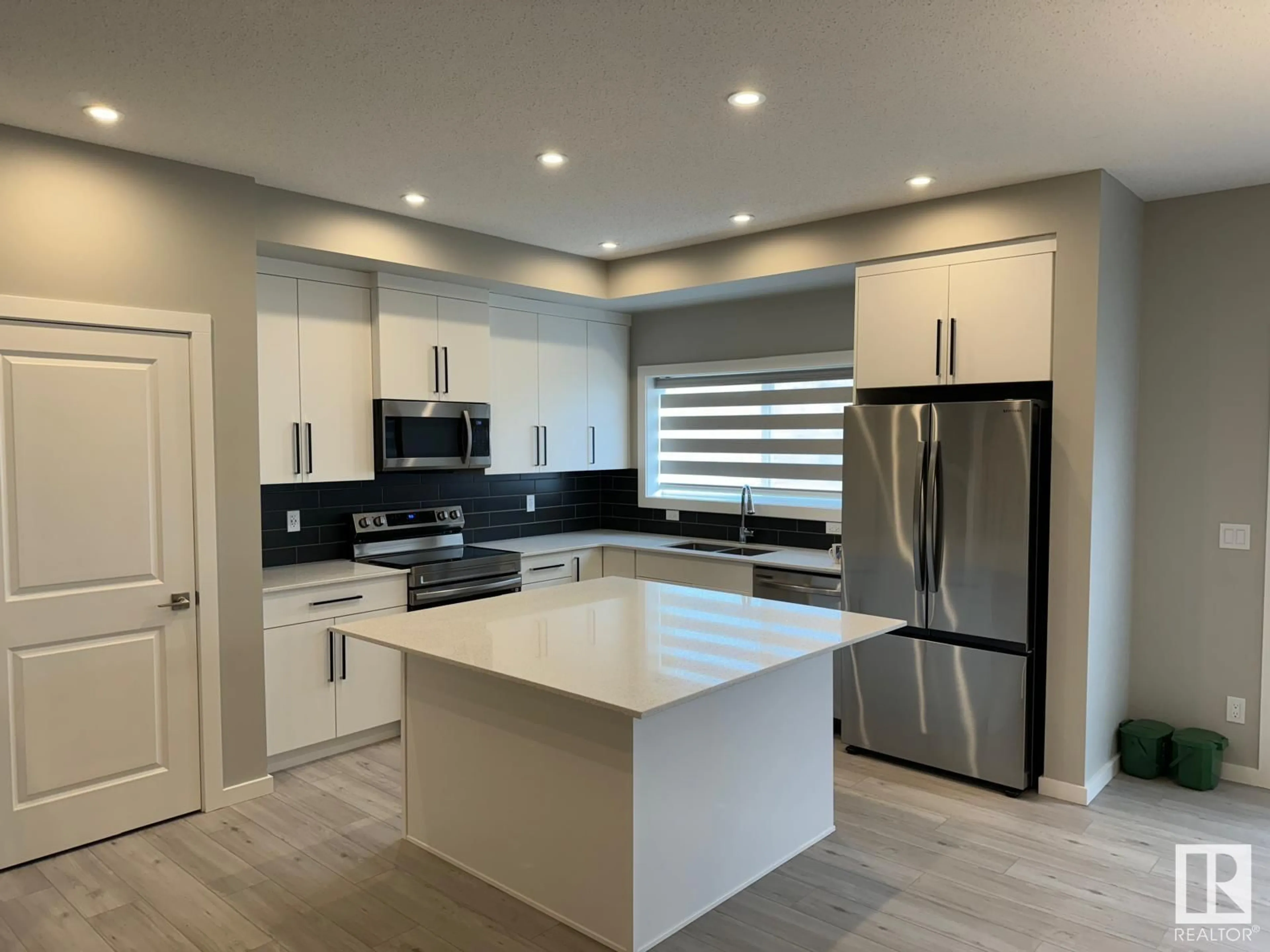 Open concept kitchen, ceramic/tile floor for 611 31 AV, Edmonton Alberta T6T2V6