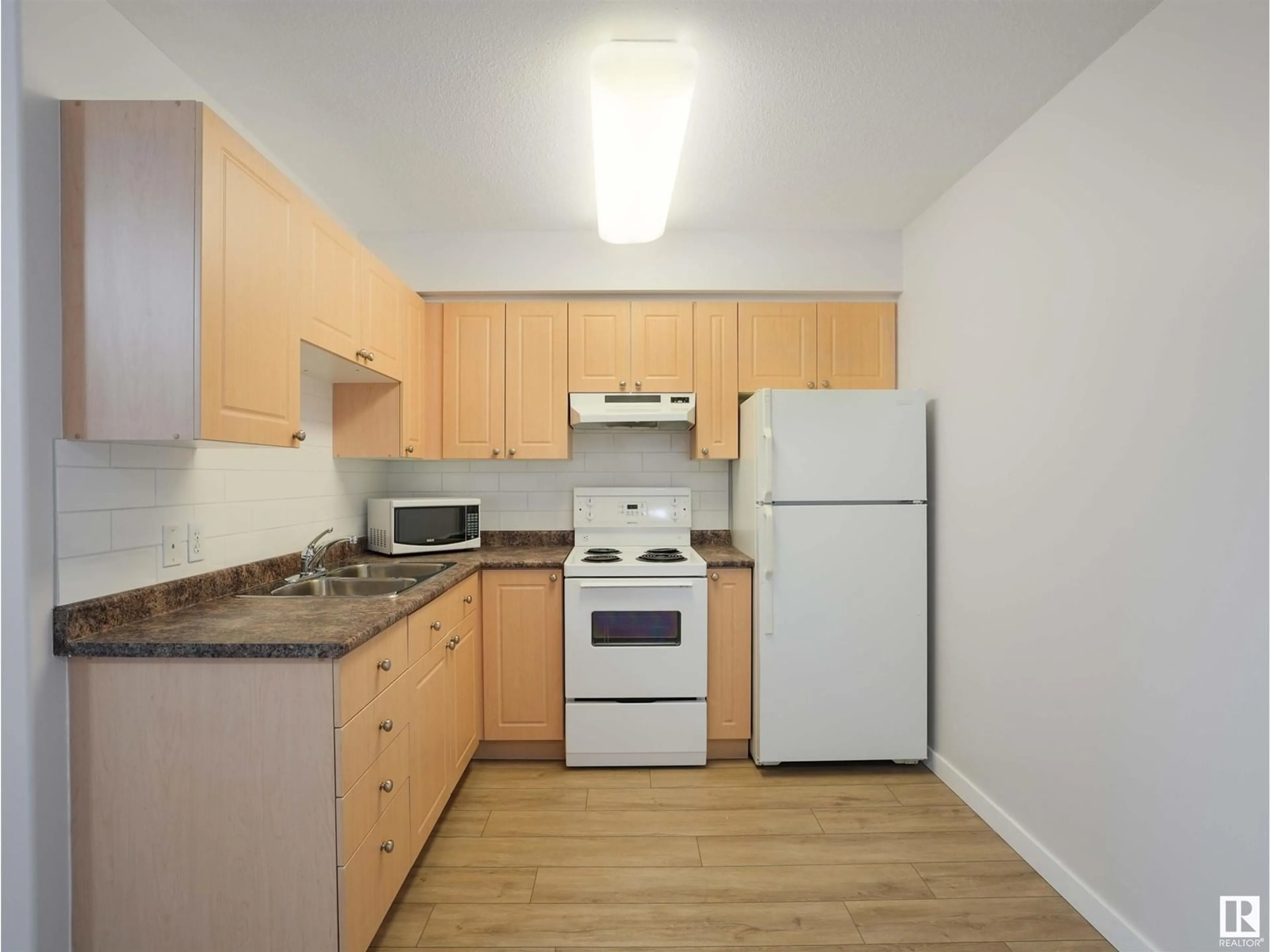 Standard kitchen, wood/laminate floor for 318 8802 SOUTHFORT, Fort Saskatchewan Alberta T8L4R6