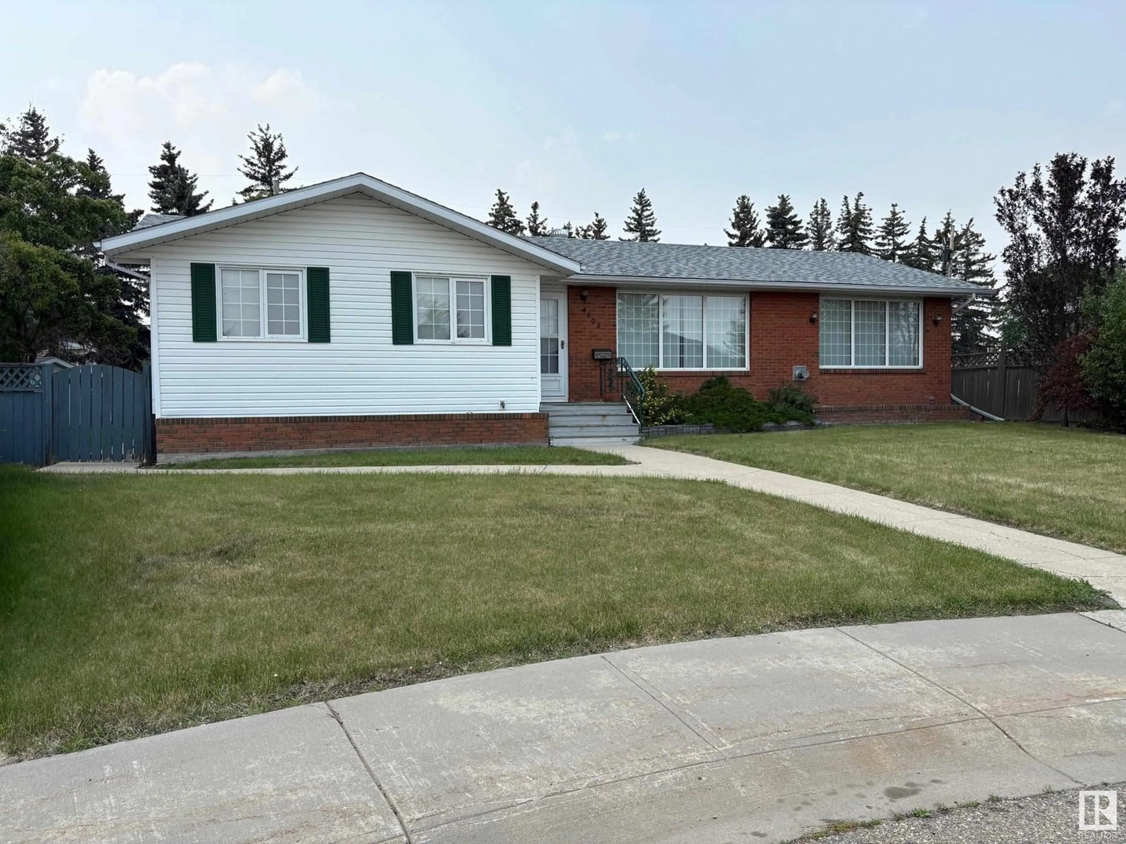 Home with vinyl exterior material, street for 4505 53 ST, Vegreville Alberta T9C1L4