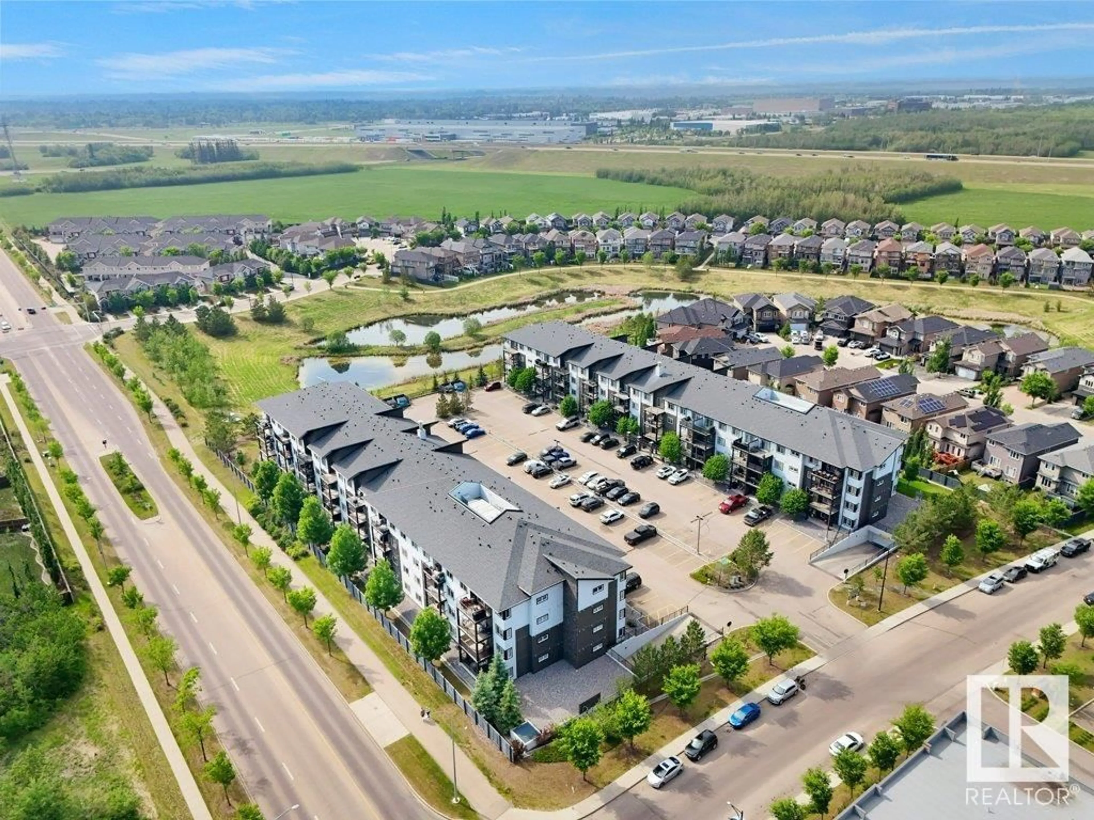 A pic from outside/outdoor area/front of a property/back of a property/a pic from drone, mountain view for 504 - 123 ALBANY WY, Edmonton Alberta T6V0L2