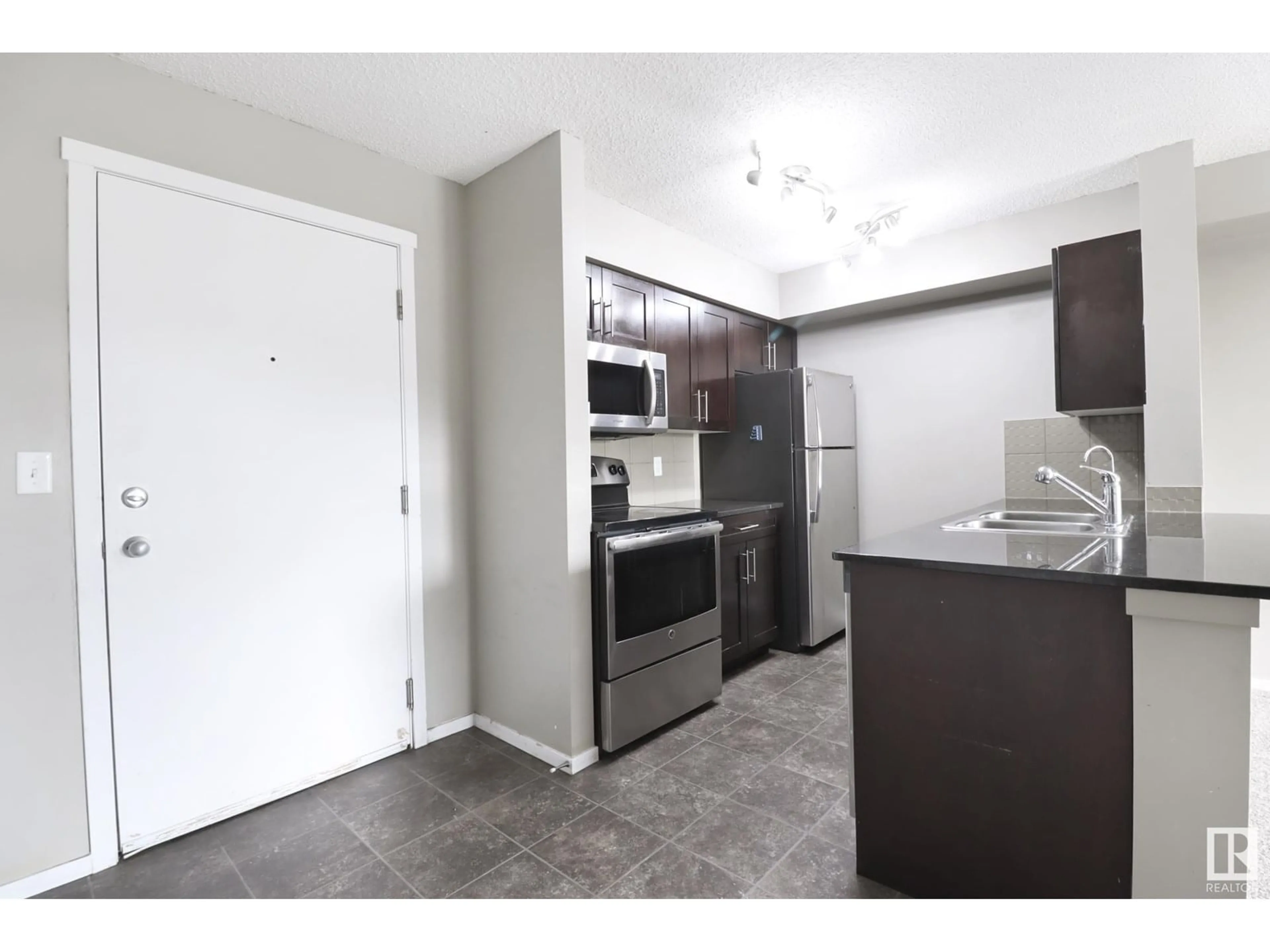 Standard kitchen, unknown for #204 - 3315 JAMES MOWATT TR, Edmonton Alberta T6W3L9