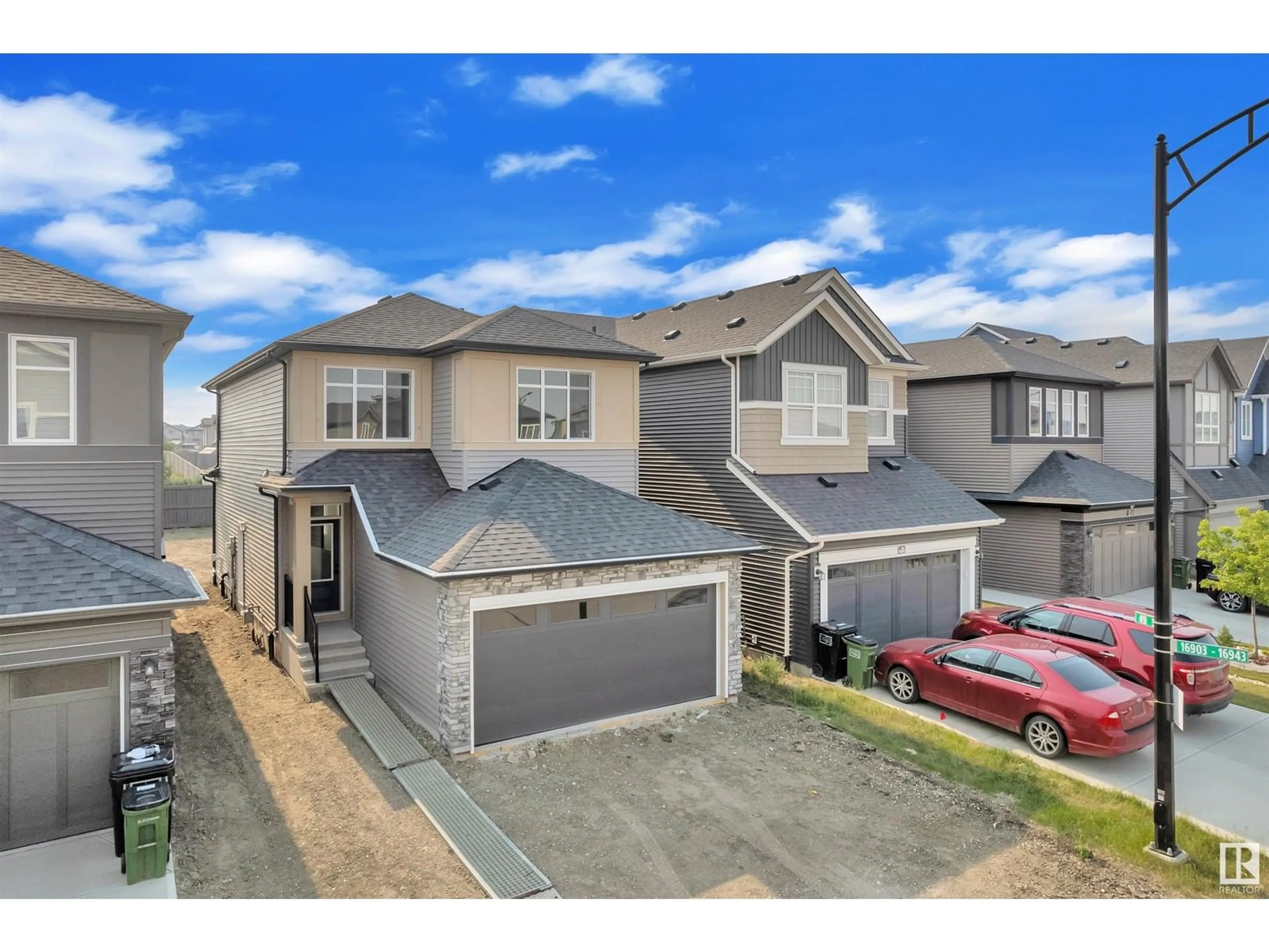 A pic from outside/outdoor area/front of a property/back of a property/a pic from drone, street for 16832 49 ST, Edmonton Alberta T5Y4G9