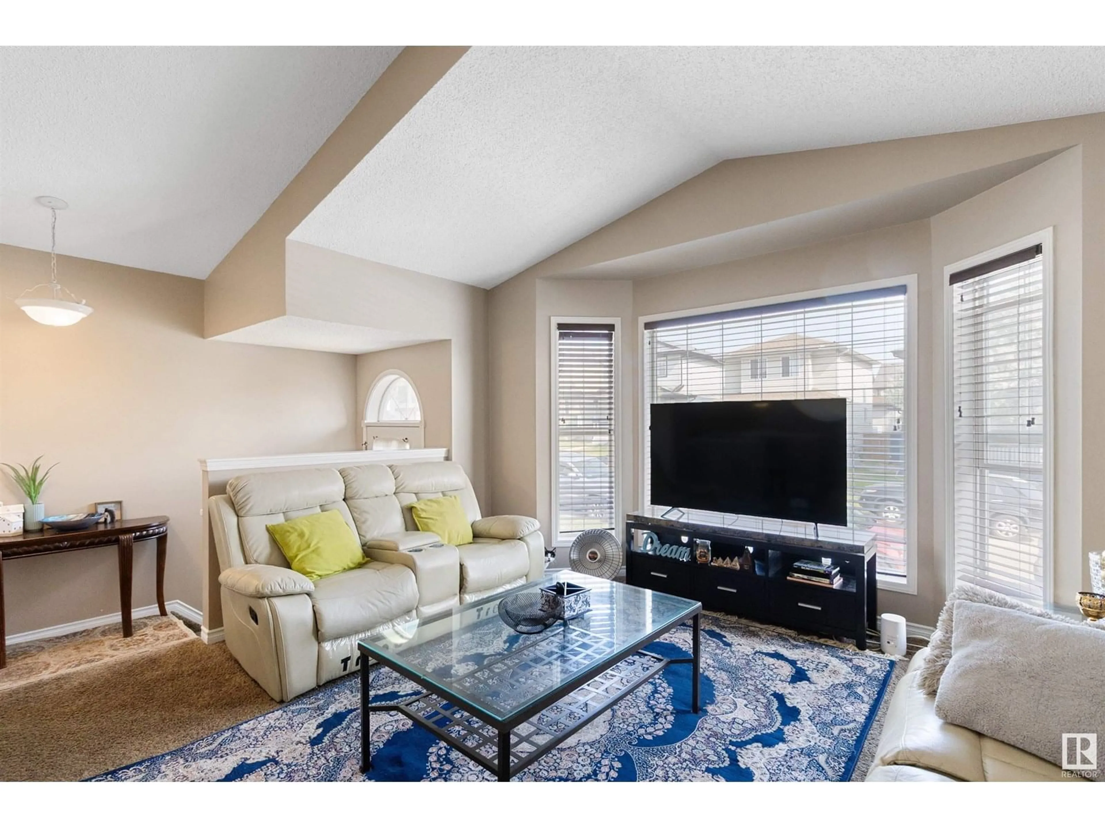Living room with furniture, unknown for NW - 4509 150 AV, Edmonton Alberta T5Y2Z8