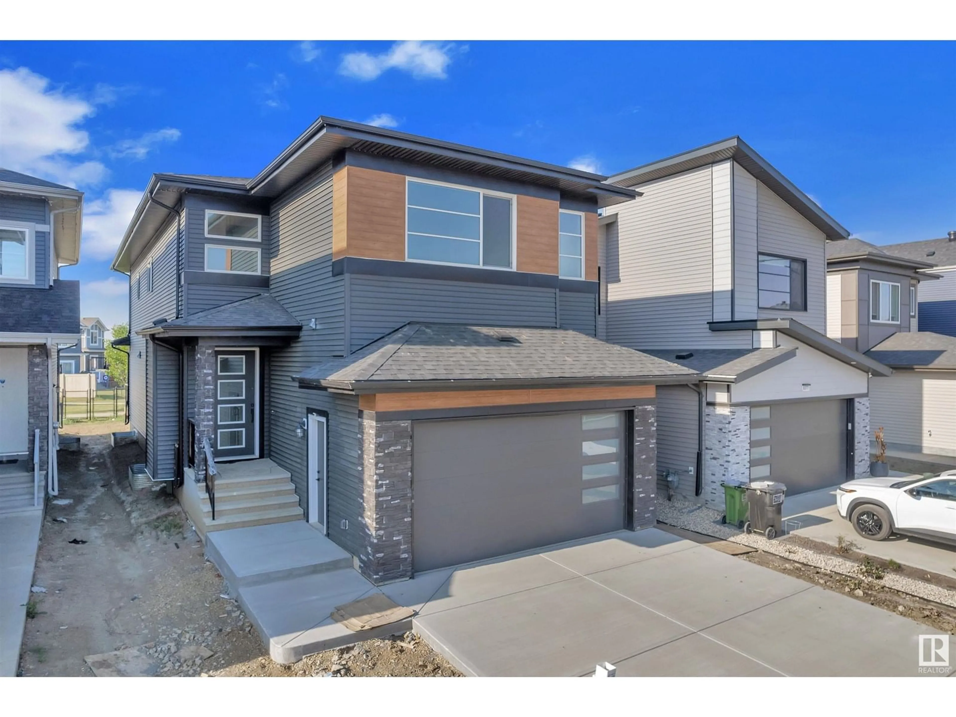 Home with brick exterior material, street for SW SW - 8379 MAYDAY LINK LI, Edmonton Alberta T6X3E6