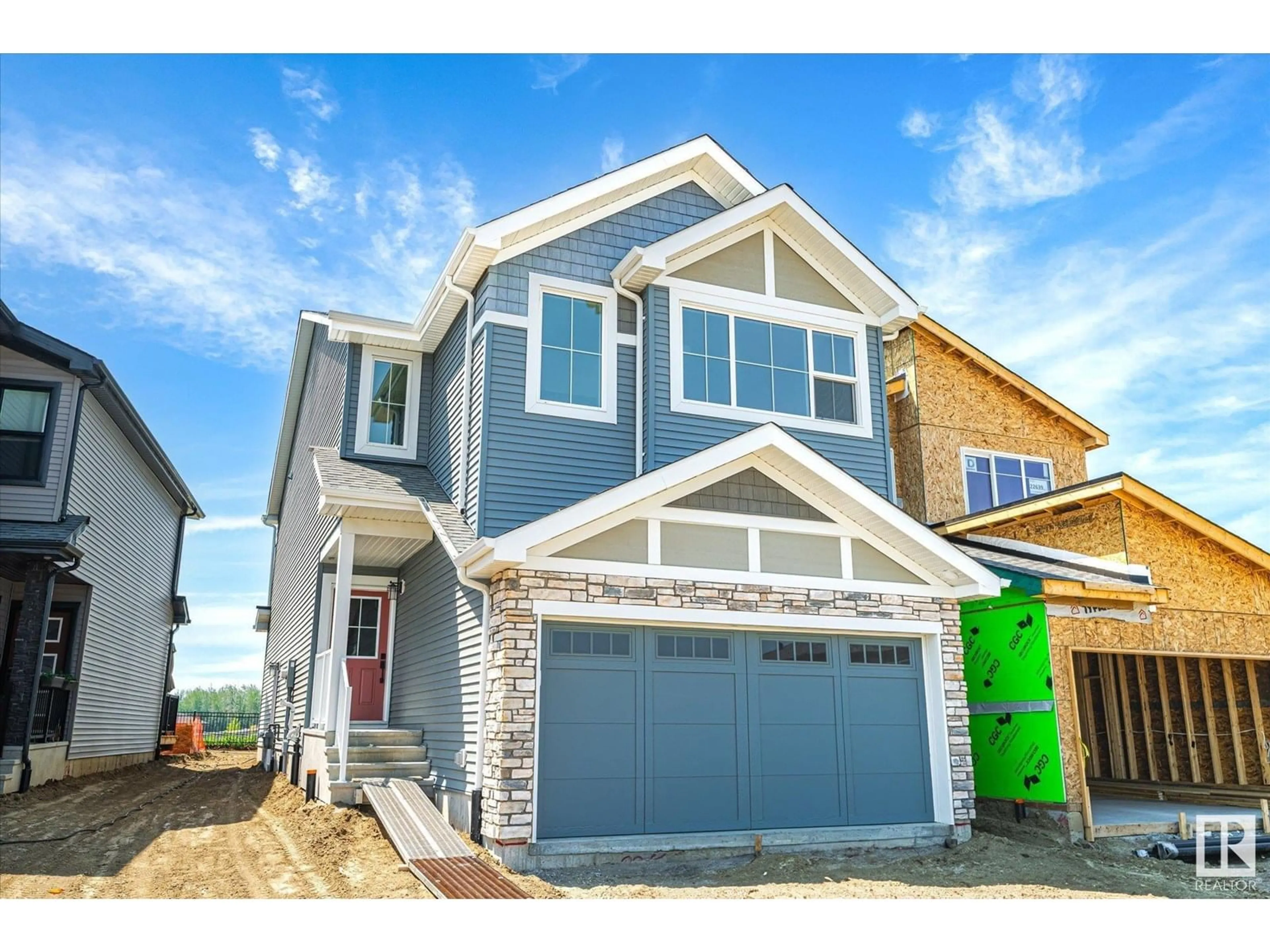 Home with vinyl exterior material, street for NW - 22635 90 AV, Edmonton Alberta T5T7X1