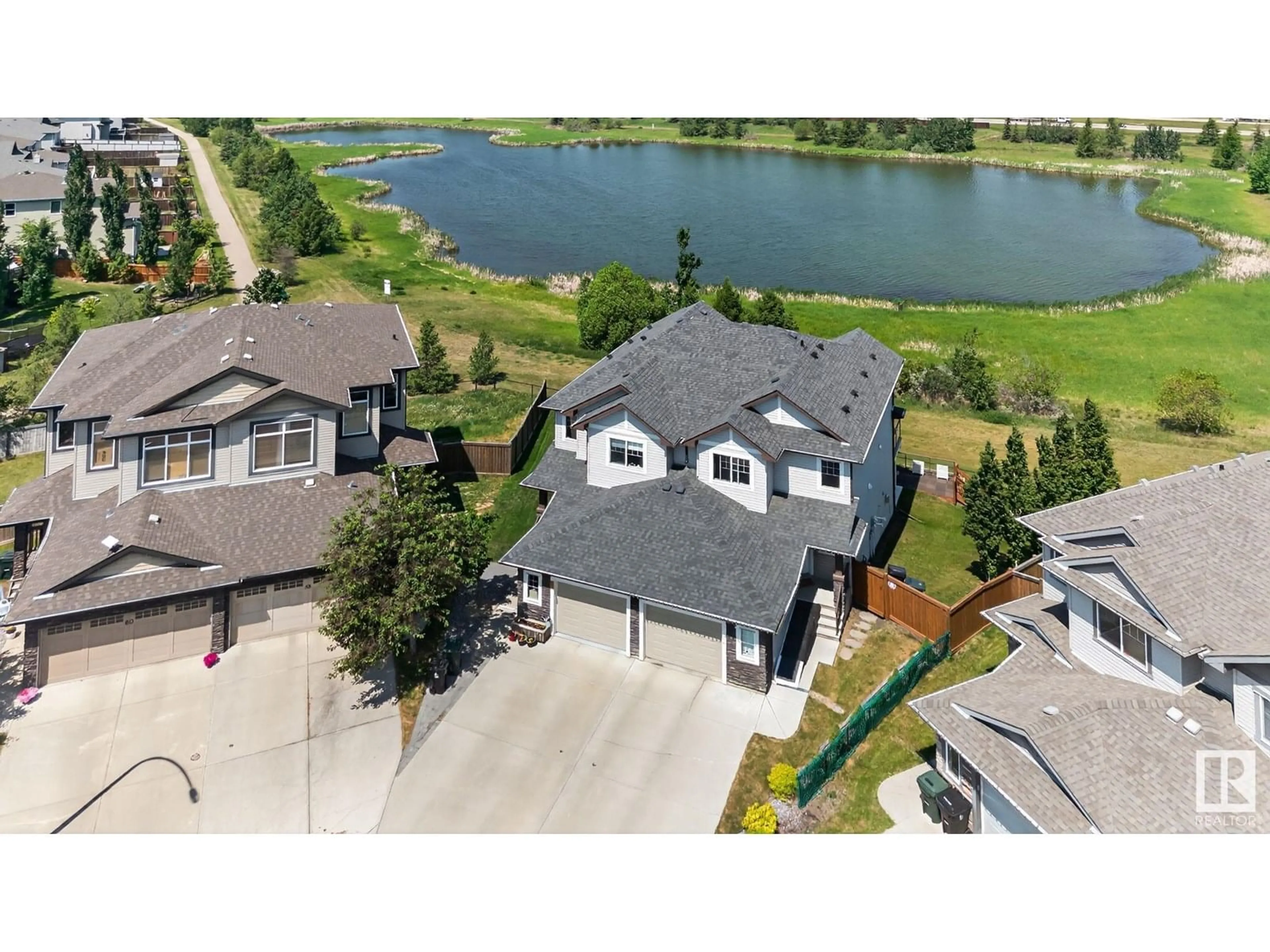 A pic from outside/outdoor area/front of a property/back of a property/a pic from drone, water/lake/river/ocean view for 54 AUSTIN CO, Spruce Grove Alberta T7X0N4