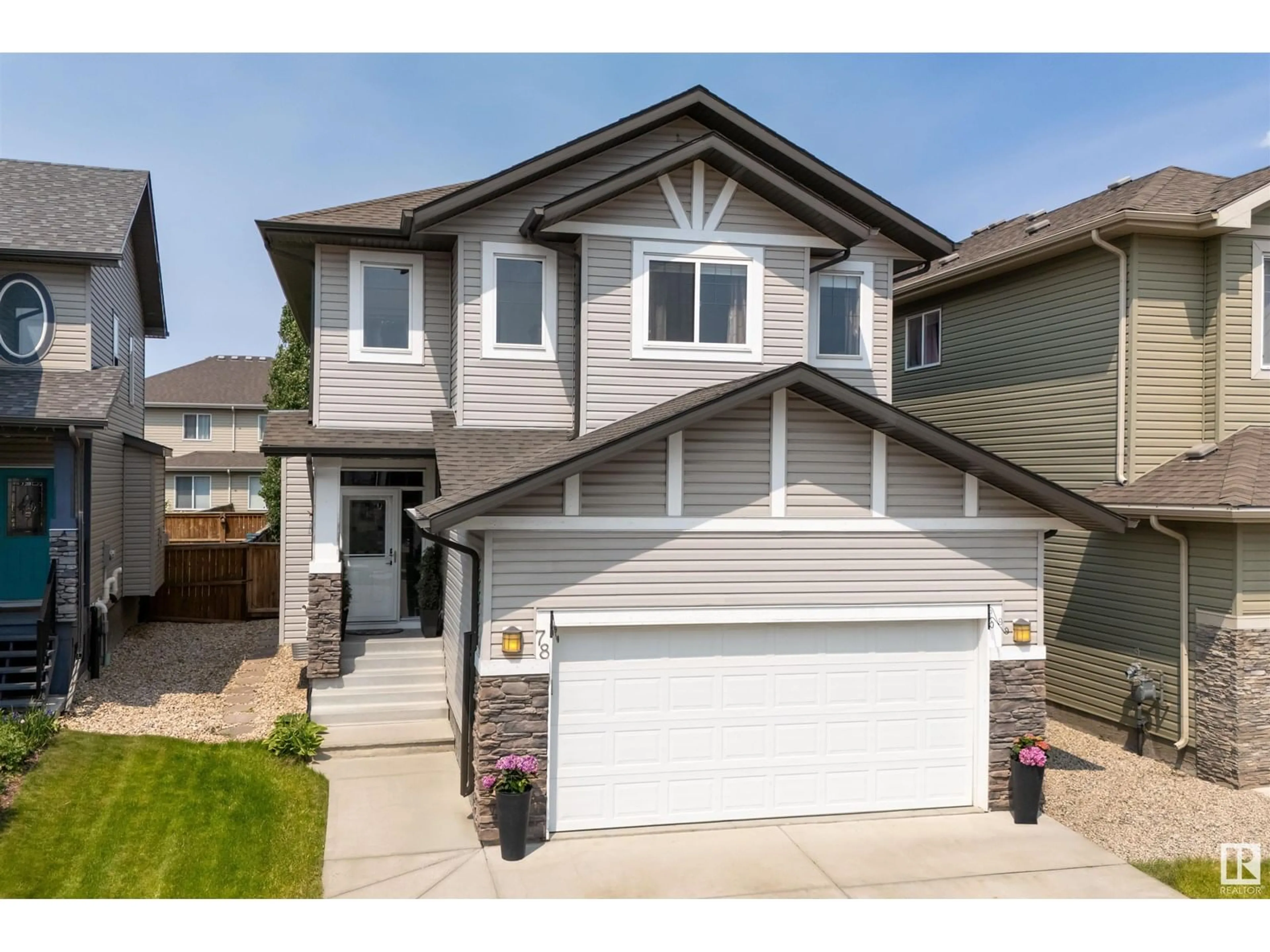 Home with vinyl exterior material, street for 78 DUNLOP WD, Leduc Alberta T9E0J7