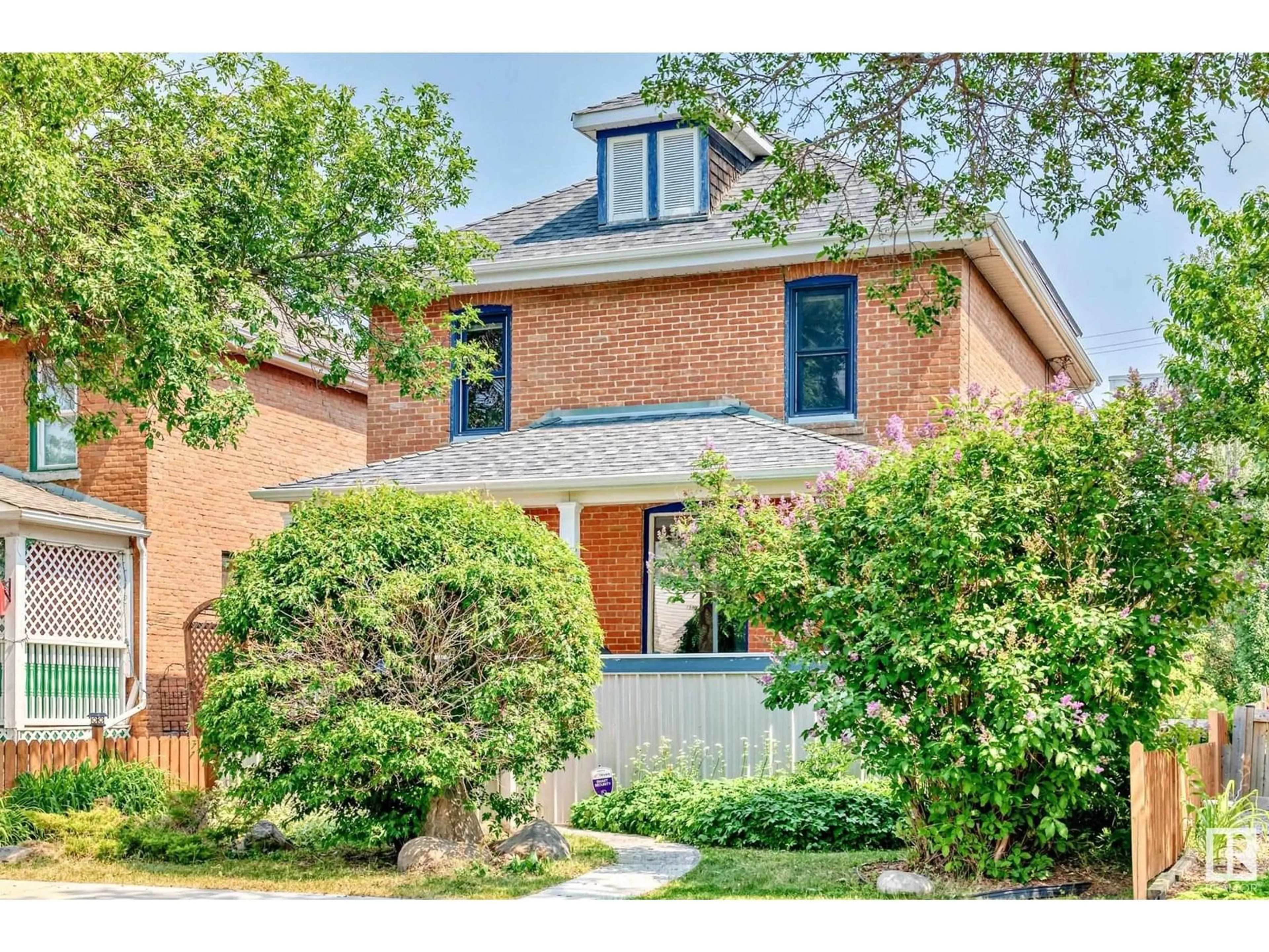 Home with brick exterior material, street for 11331 95A ST NW, Edmonton Alberta T5G1P2