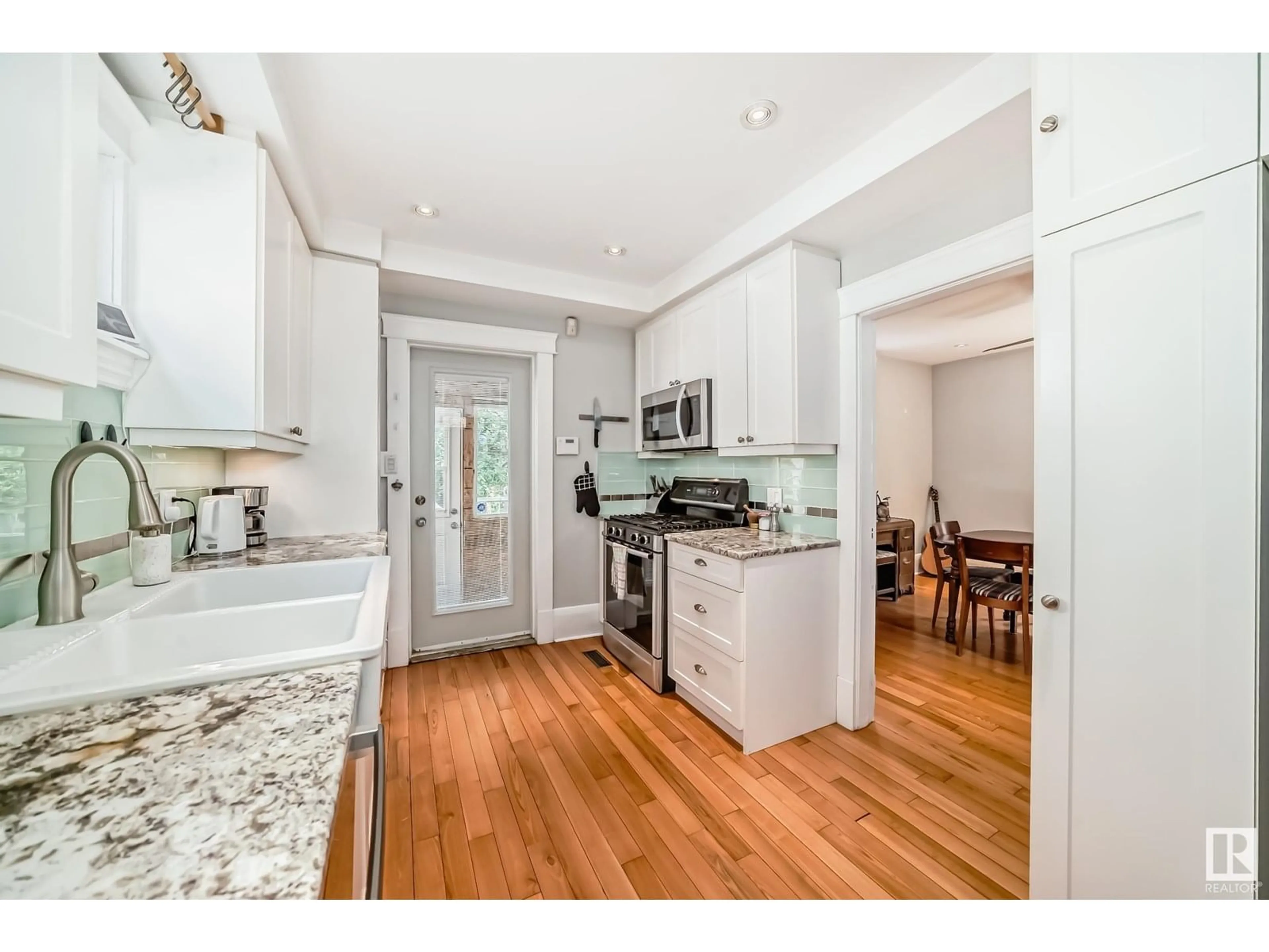 Open concept kitchen, unknown for 11331 95A ST NW, Edmonton Alberta T5G1P2