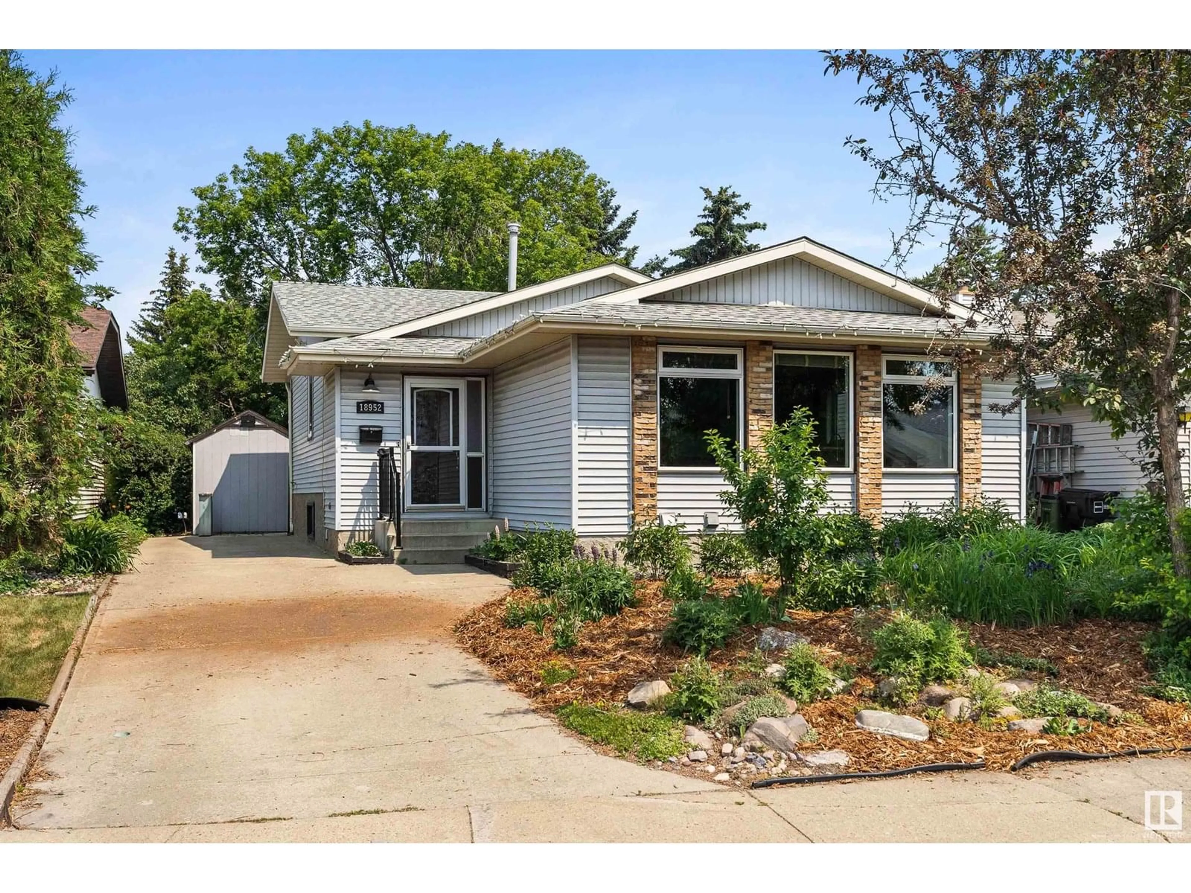 Home with vinyl exterior material, street for 18952 82 AV, Edmonton Alberta T5T5C6