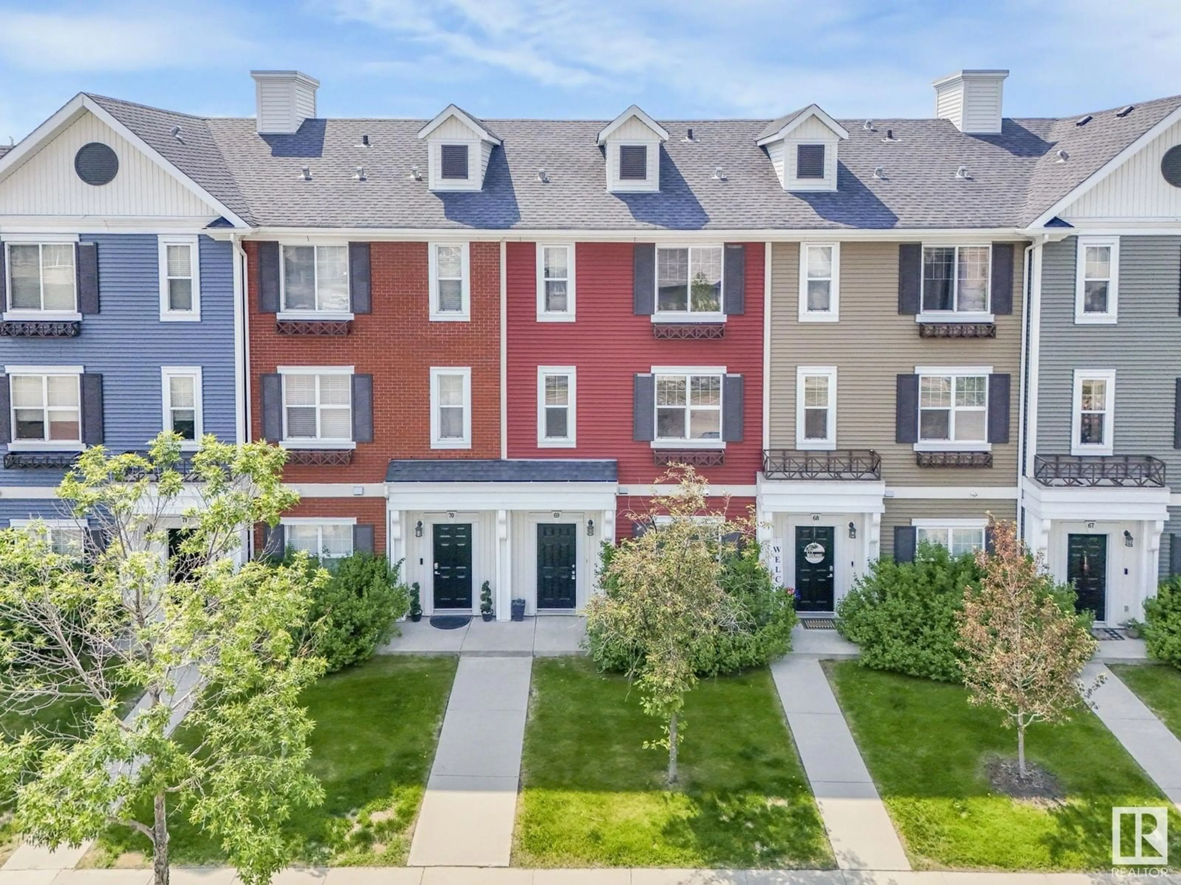 A pic from outside/outdoor area/front of a property/back of a property/a pic from drone, street for 69 8315 180 AV NW, Edmonton Alberta T5Z0J2