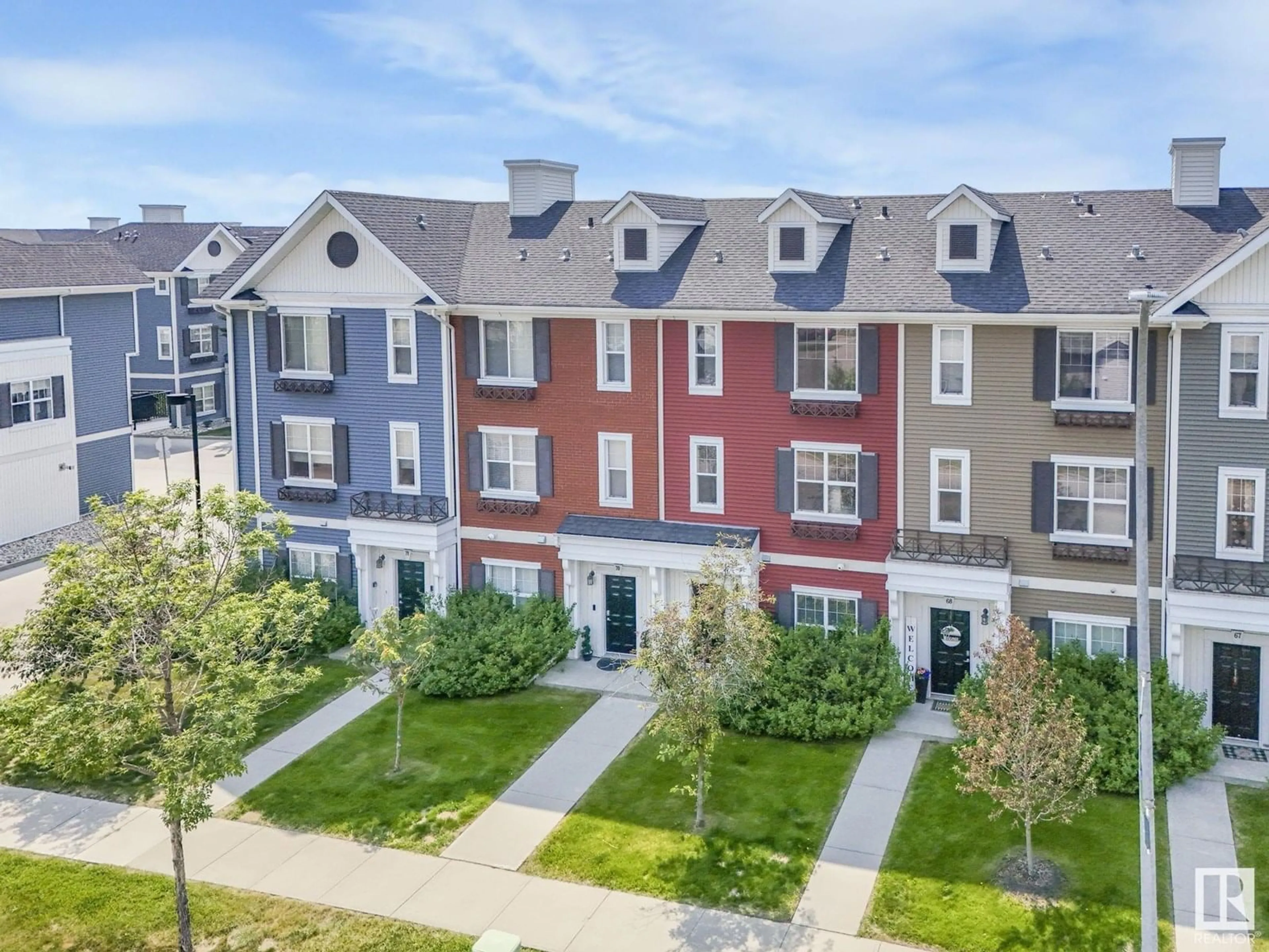 A pic from outside/outdoor area/front of a property/back of a property/a pic from drone, unknown for 69 8315 180 AV NW, Edmonton Alberta T5Z0J2