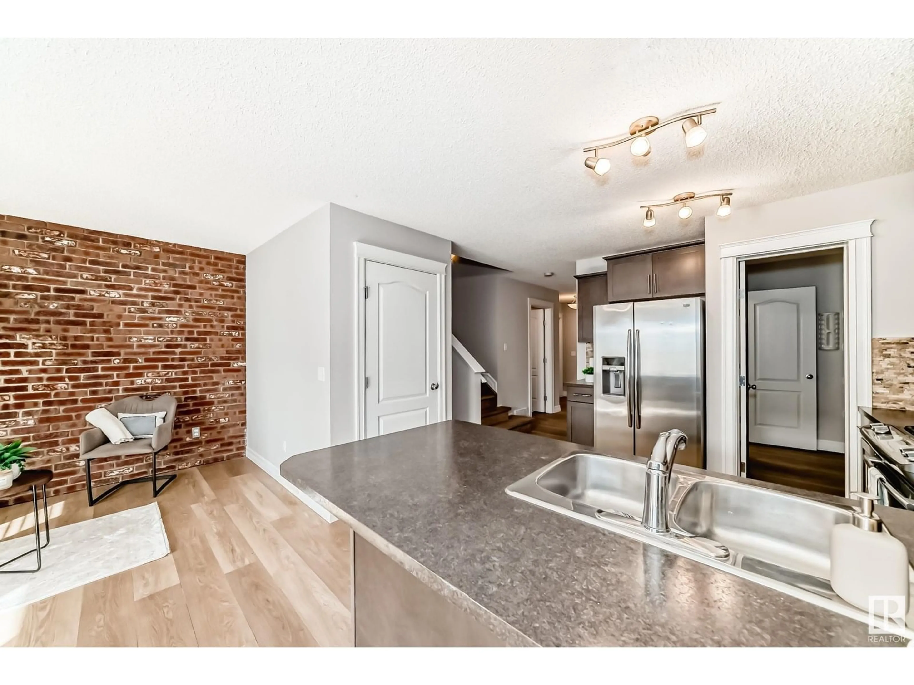 Open concept kitchen, unknown for 5407 15 AV, Edmonton Alberta T6X1R5