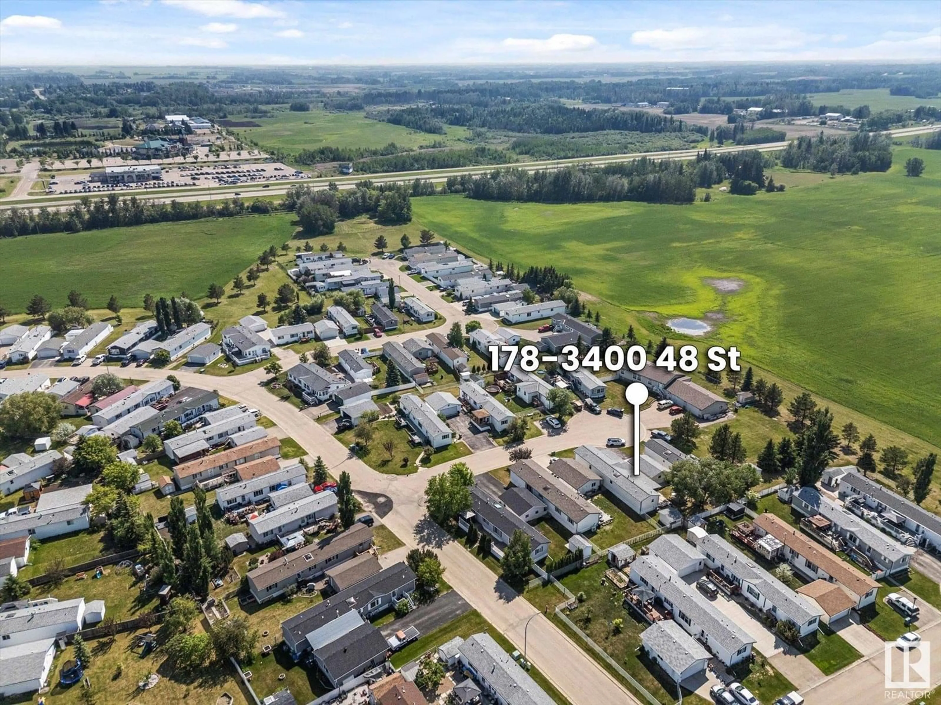 A pic from outside/outdoor area/front of a property/back of a property/a pic from drone, street for 178 - 3400 48 ST, Stony Plain Alberta T7Z1W2