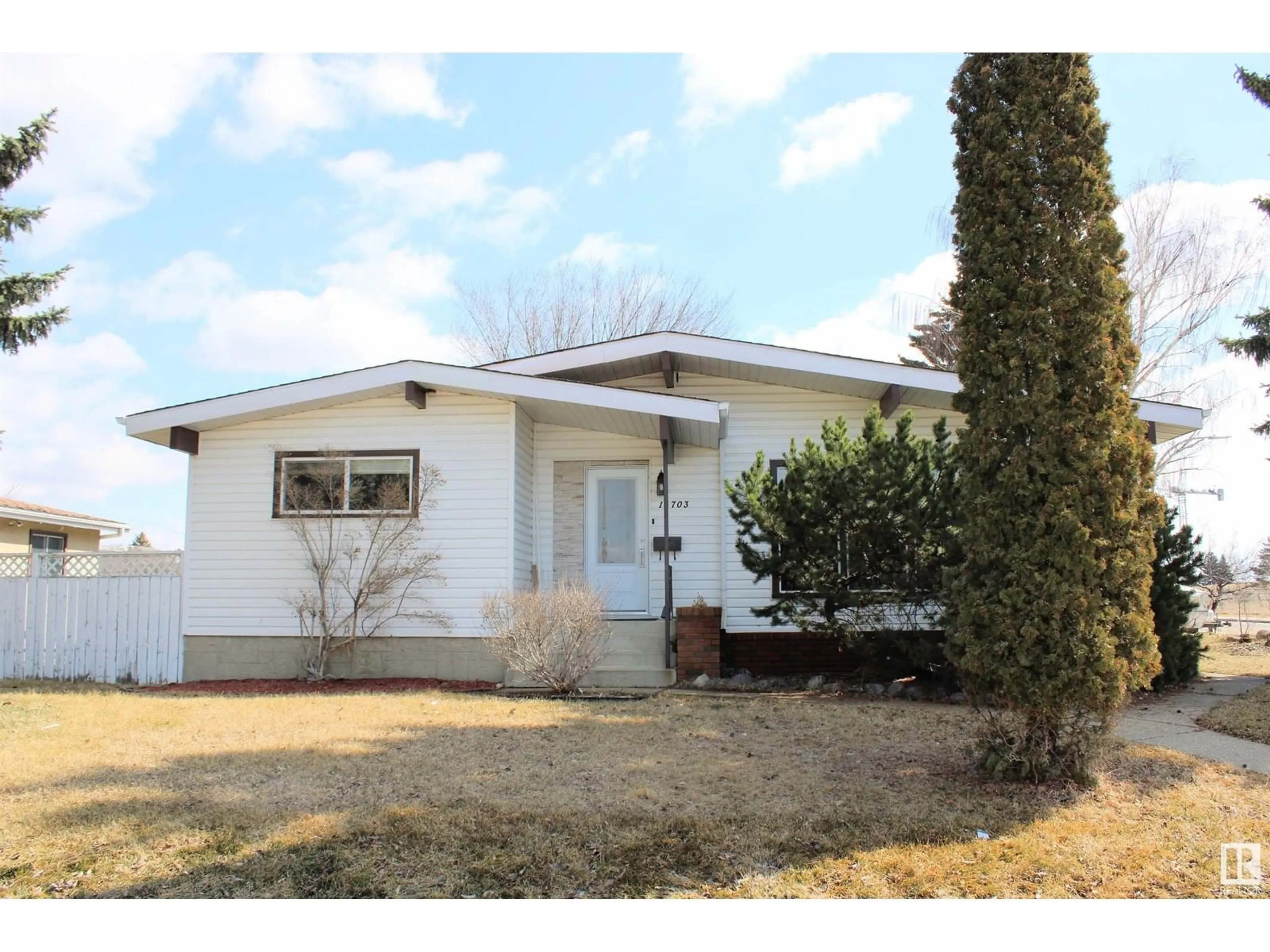 Home with vinyl exterior material, street for 14703 75A ST NW, Edmonton Alberta T5C1A3