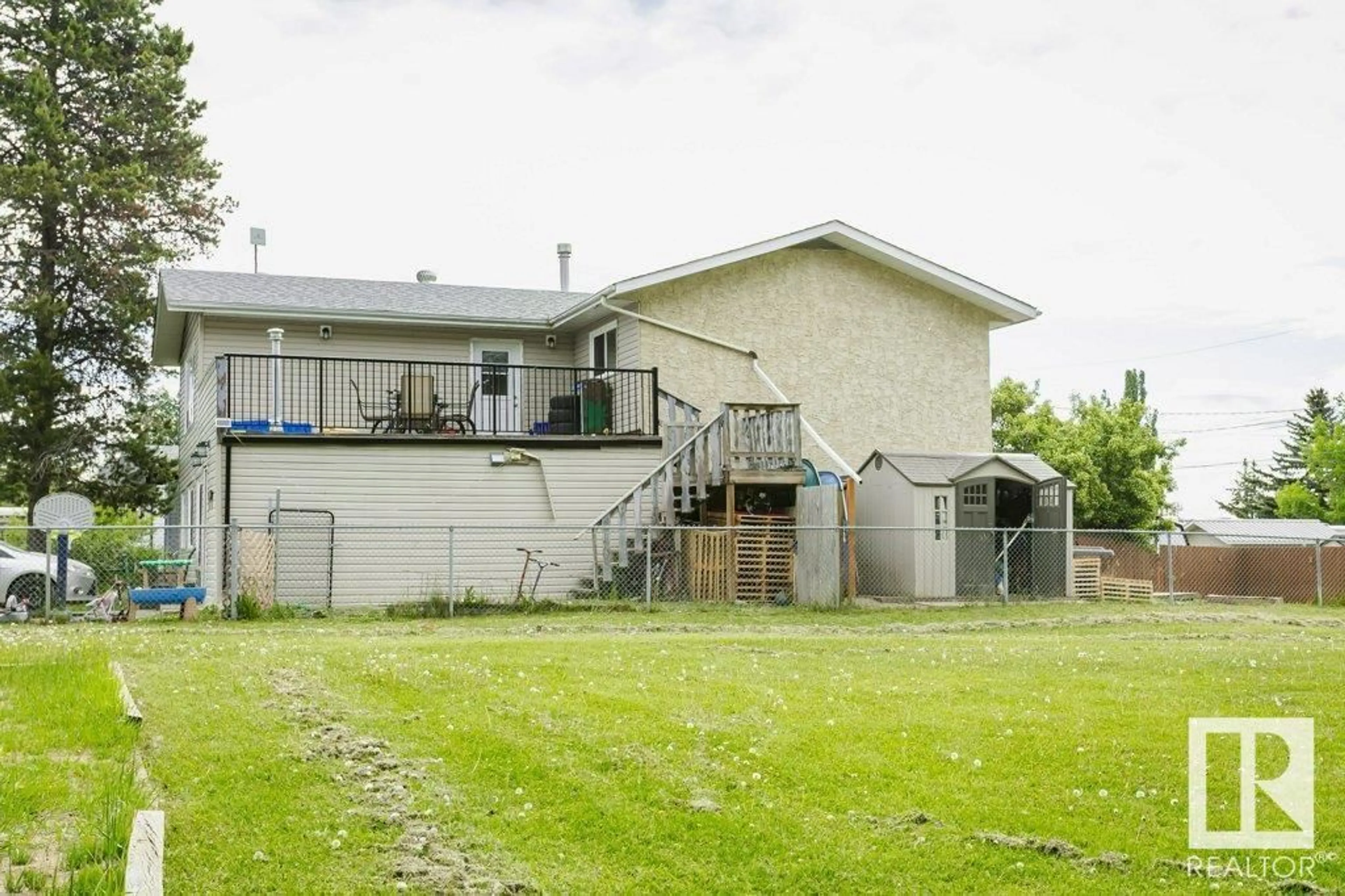 A pic from outside/outdoor area/front of a property/back of a property/a pic from drone, unknown for 5025 55 AV, Wabamun Alberta T0E2K0