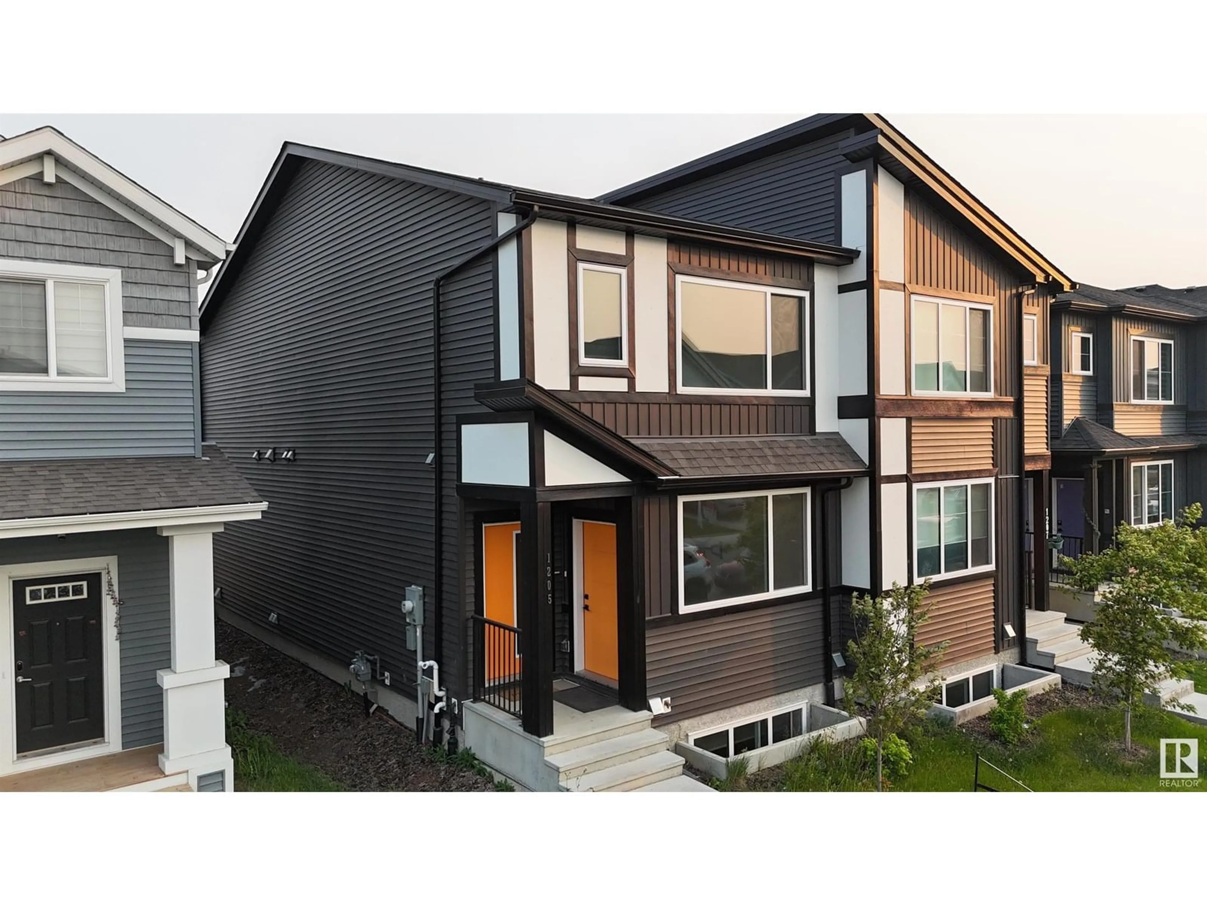 Home with vinyl exterior material, street for 1205 PODERSKY WD, Edmonton Alberta T6W4W3