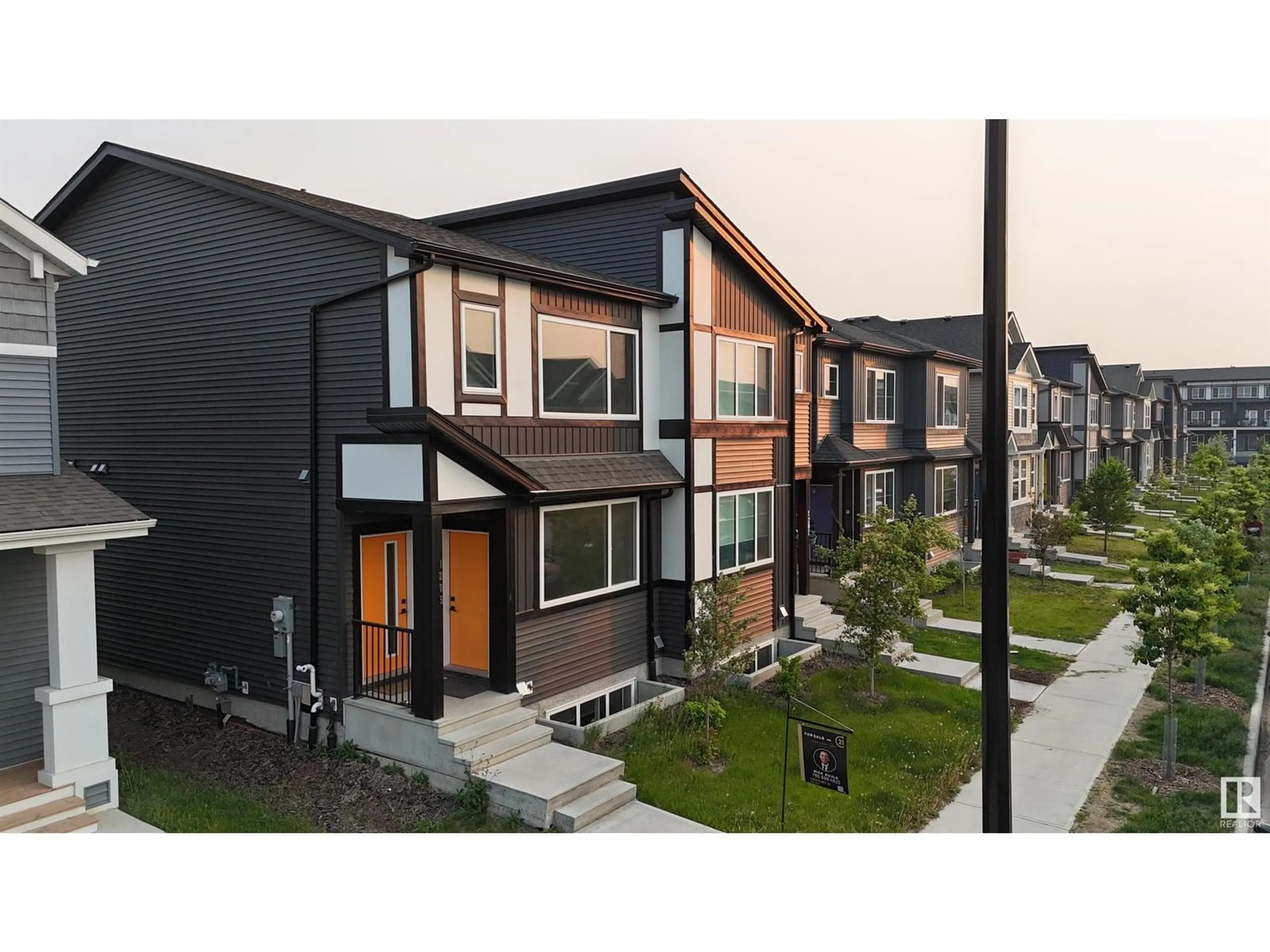Home with vinyl exterior material, street for 1205 PODERSKY WD, Edmonton Alberta T6W4W3