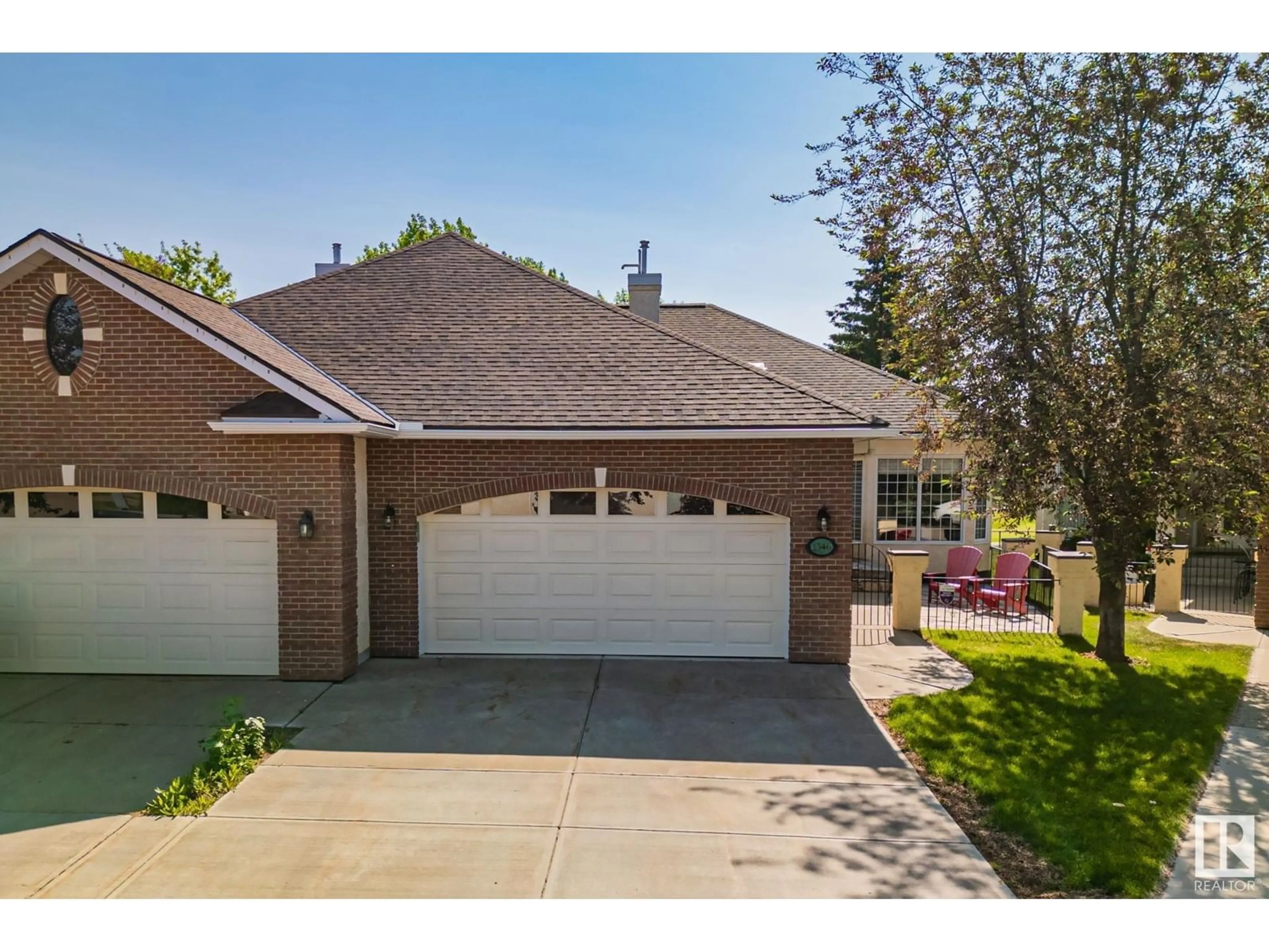 Home with brick exterior material, street for 1346 POTTER GREENS DR, Edmonton Alberta T5T6A3