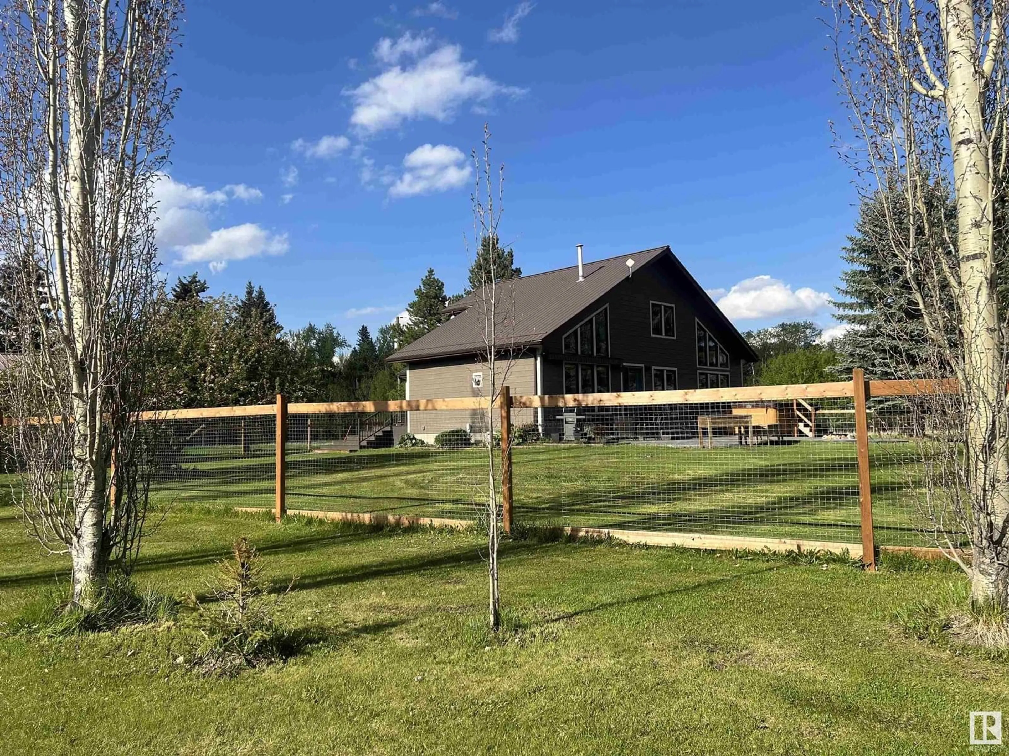A pic from outside/outdoor area/front of a property/back of a property/a pic from drone, mountain view for 271054 TOWNSHIP 465 RD, Rural Wetaskiwin County Alberta T9A1X2