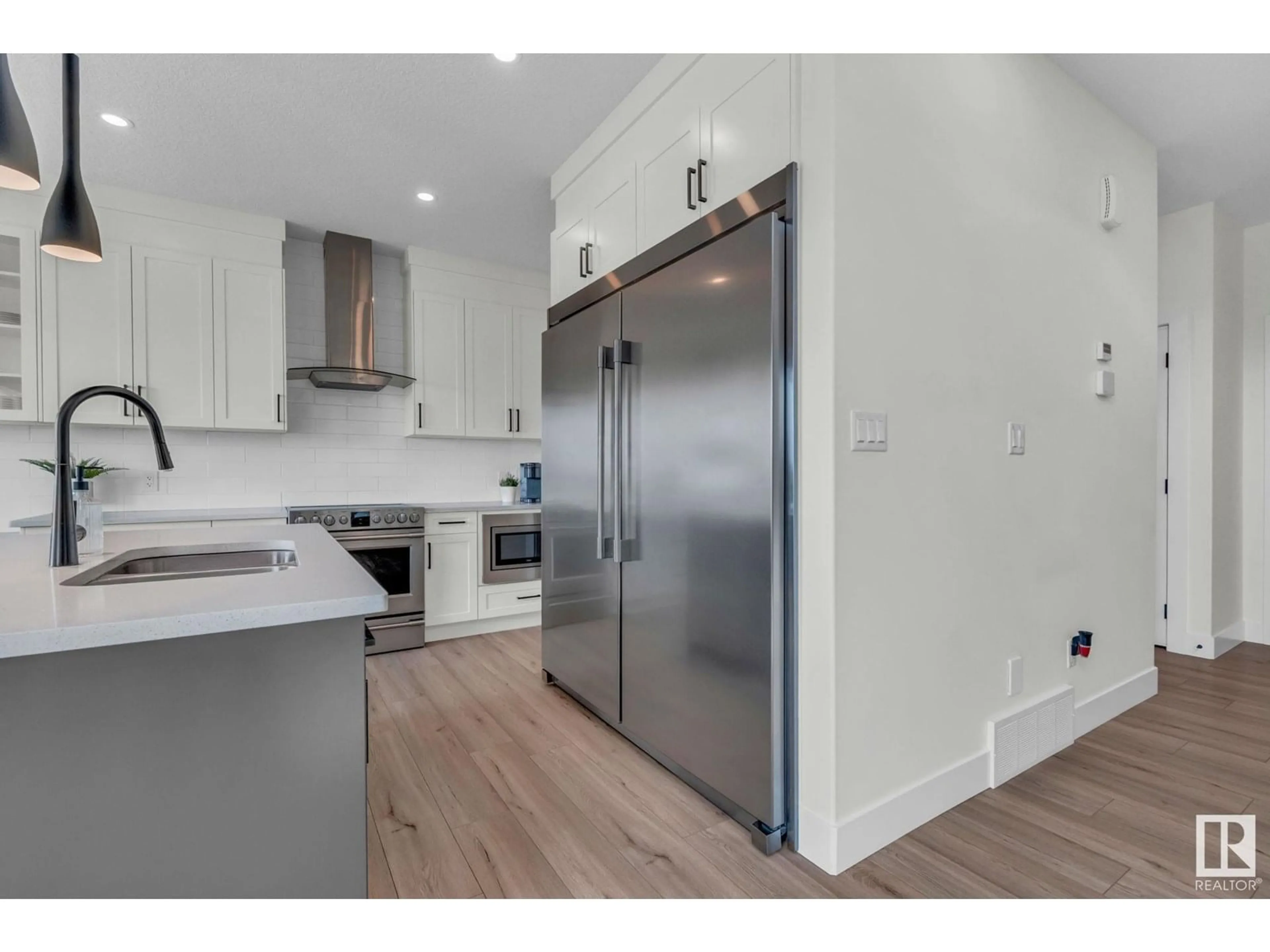 Open concept kitchen, wood/laminate floor for 3 BOULDER, Leduc Alberta T9E1H2