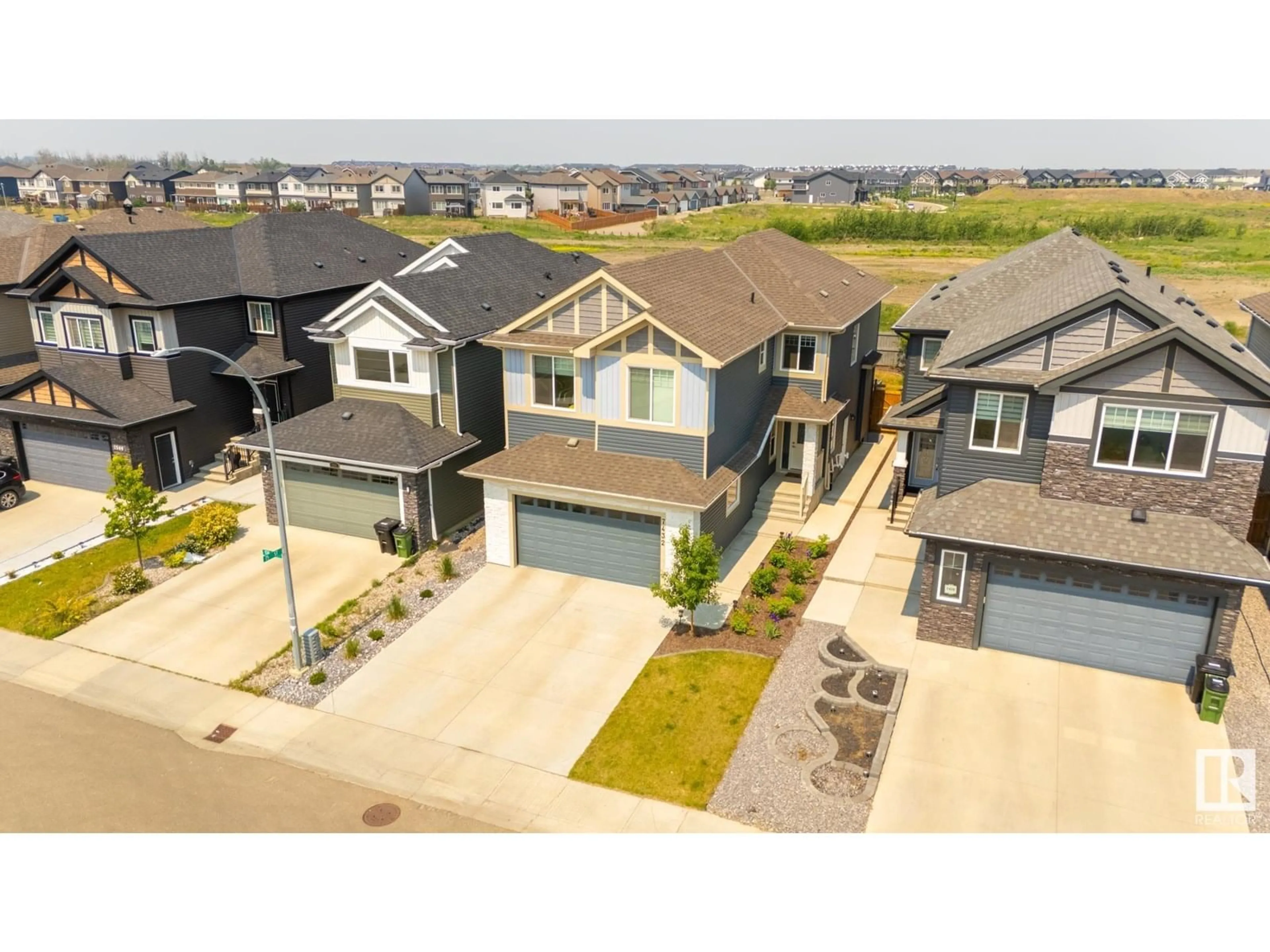 A pic from outside/outdoor area/front of a property/back of a property/a pic from drone, street for 7432 174 AV, Edmonton Alberta T5Z0J7