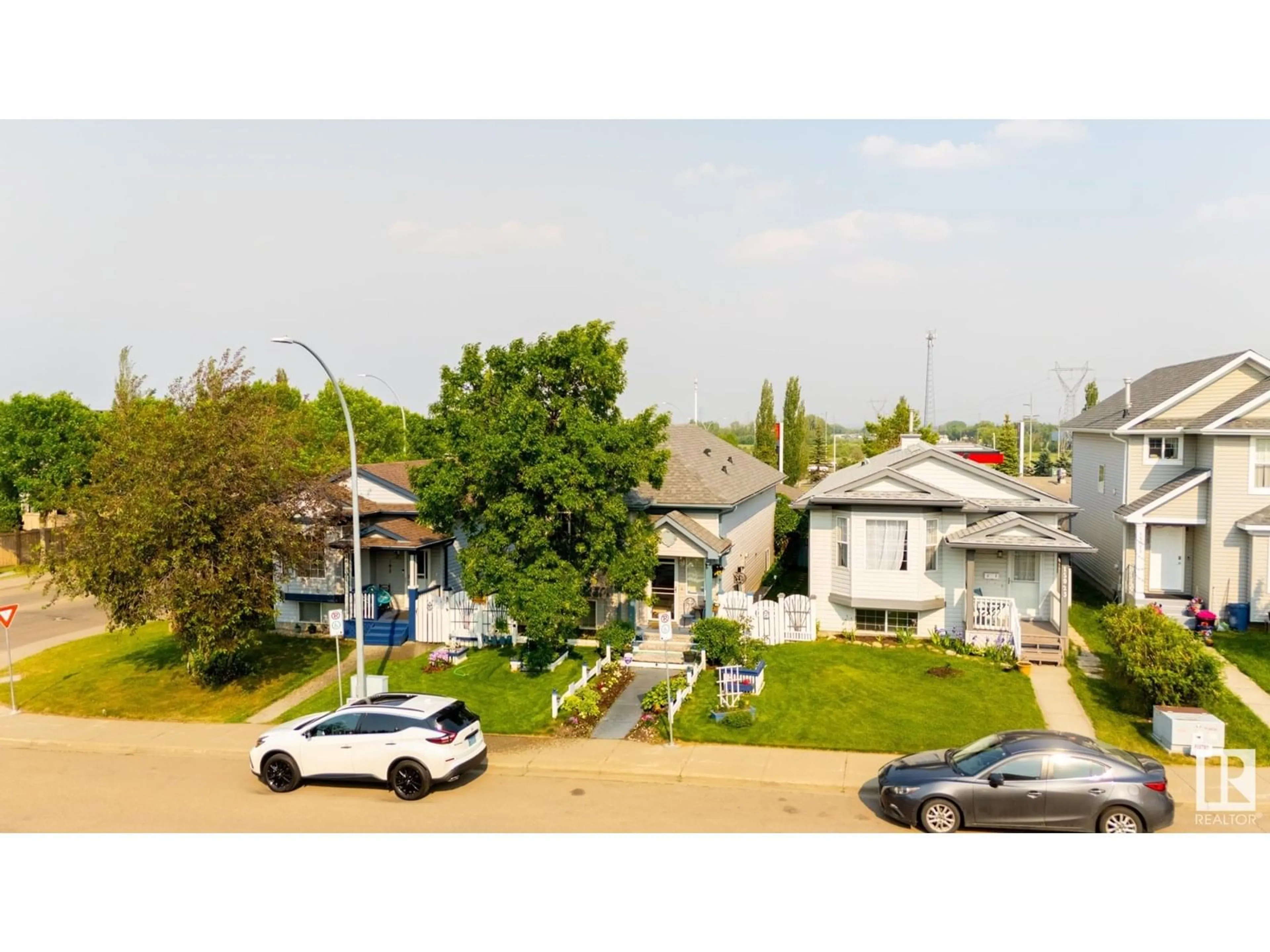 A pic from outside/outdoor area/front of a property/back of a property/a pic from drone, street for 15927 38 ST, Edmonton Alberta T5Y3E9
