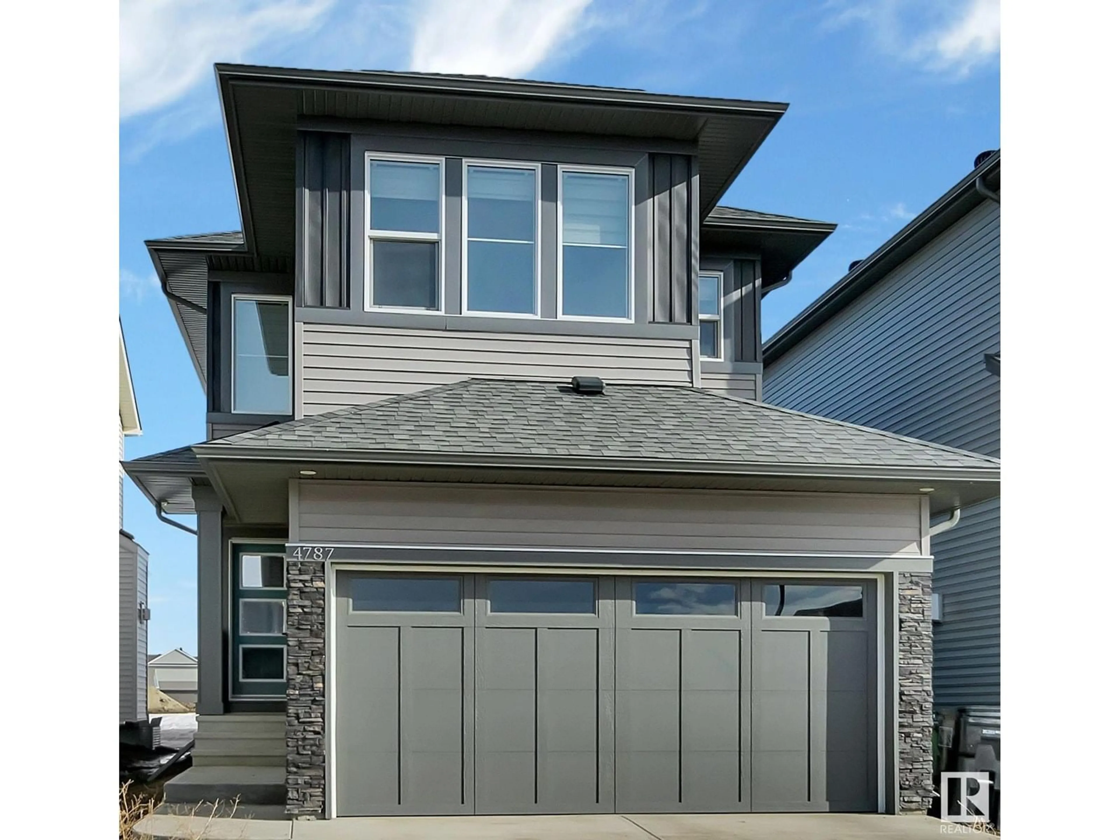 Home with vinyl exterior material, street for 4787 KINNEY RD, Edmonton Alberta T6W5G4