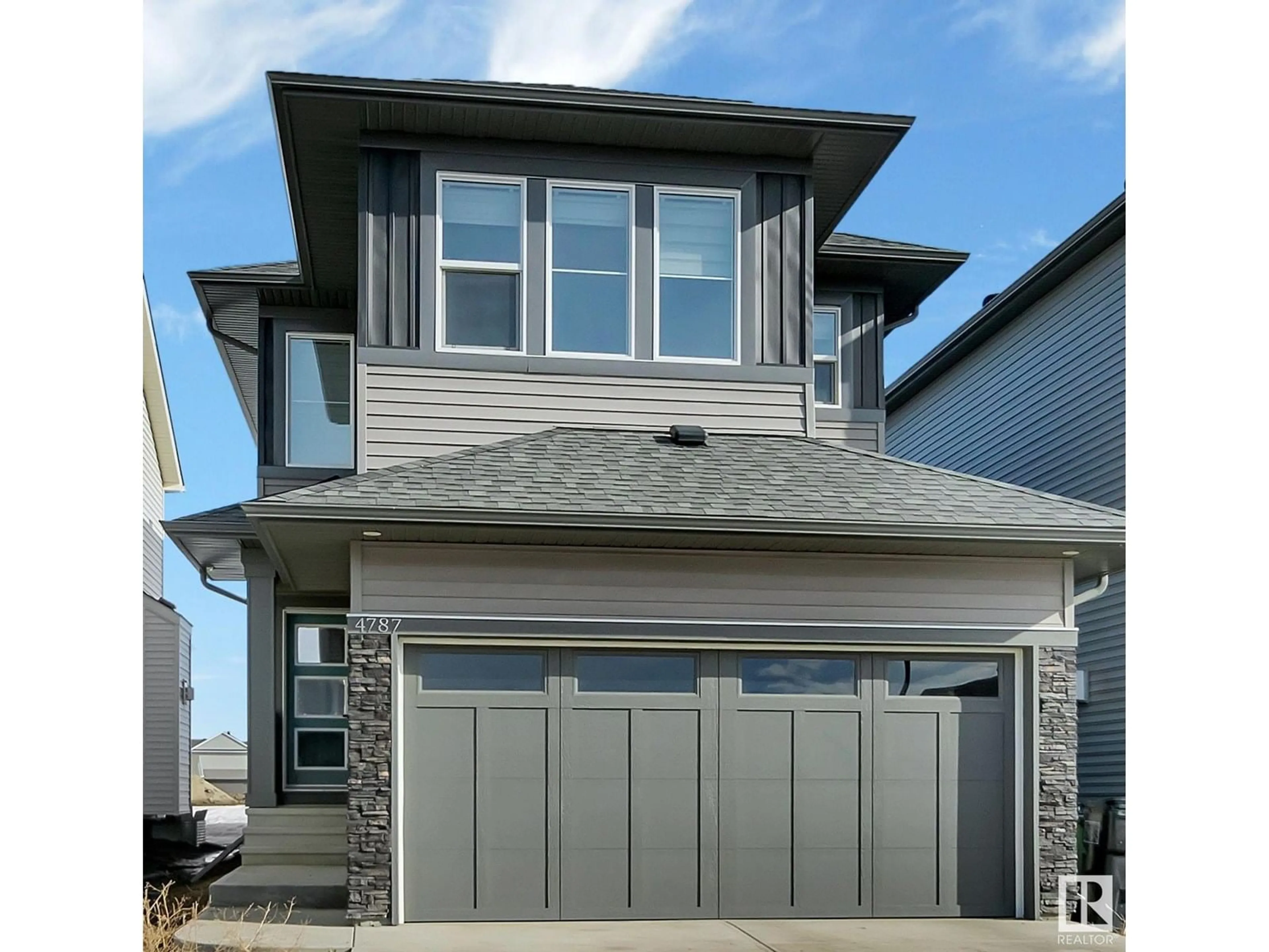 Home with vinyl exterior material, street for 4787 KINNEY RD, Edmonton Alberta T6W5G4