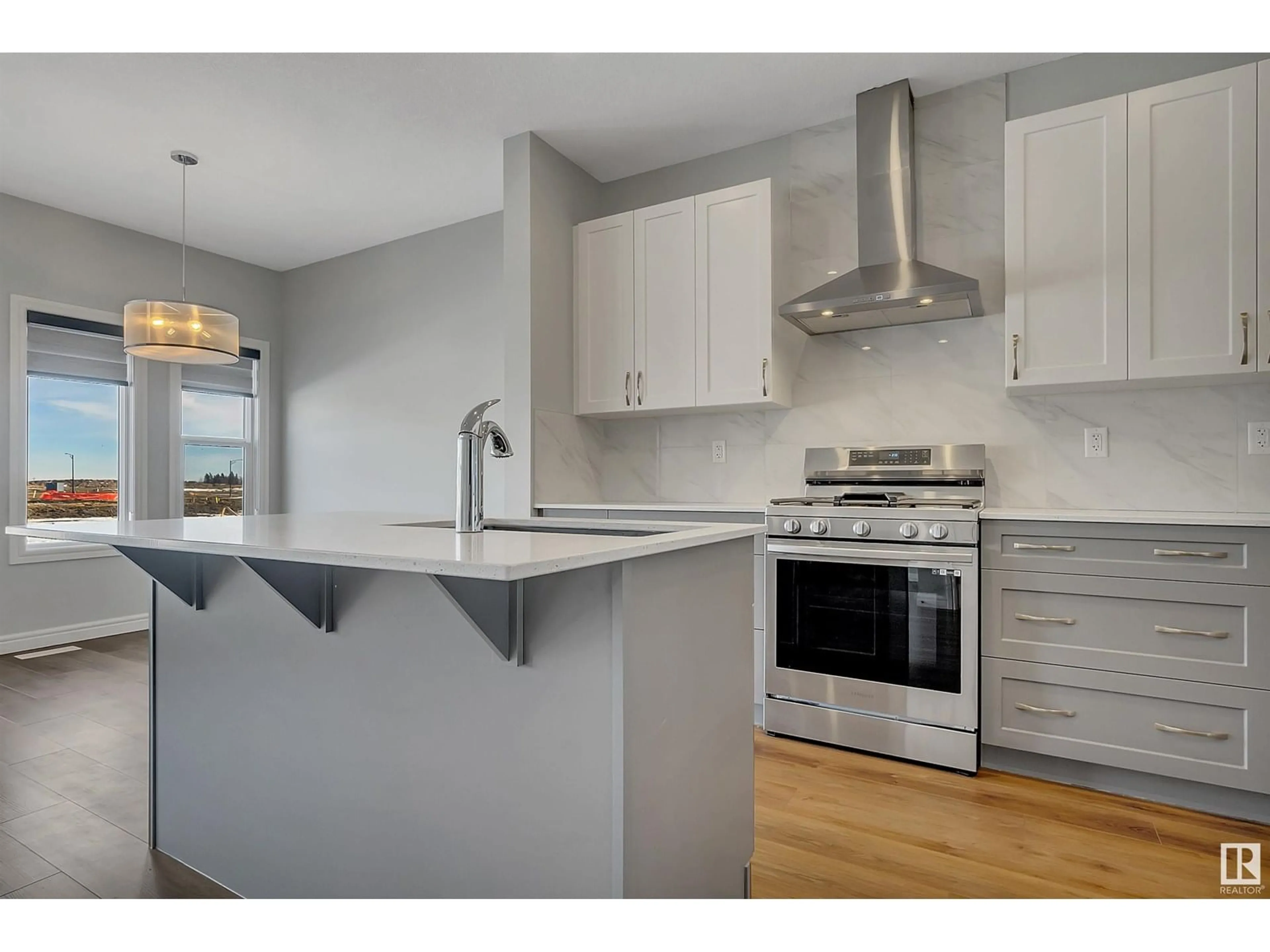 Open concept kitchen, wood/laminate floor for 4787 KINNEY RD, Edmonton Alberta T6W5G4