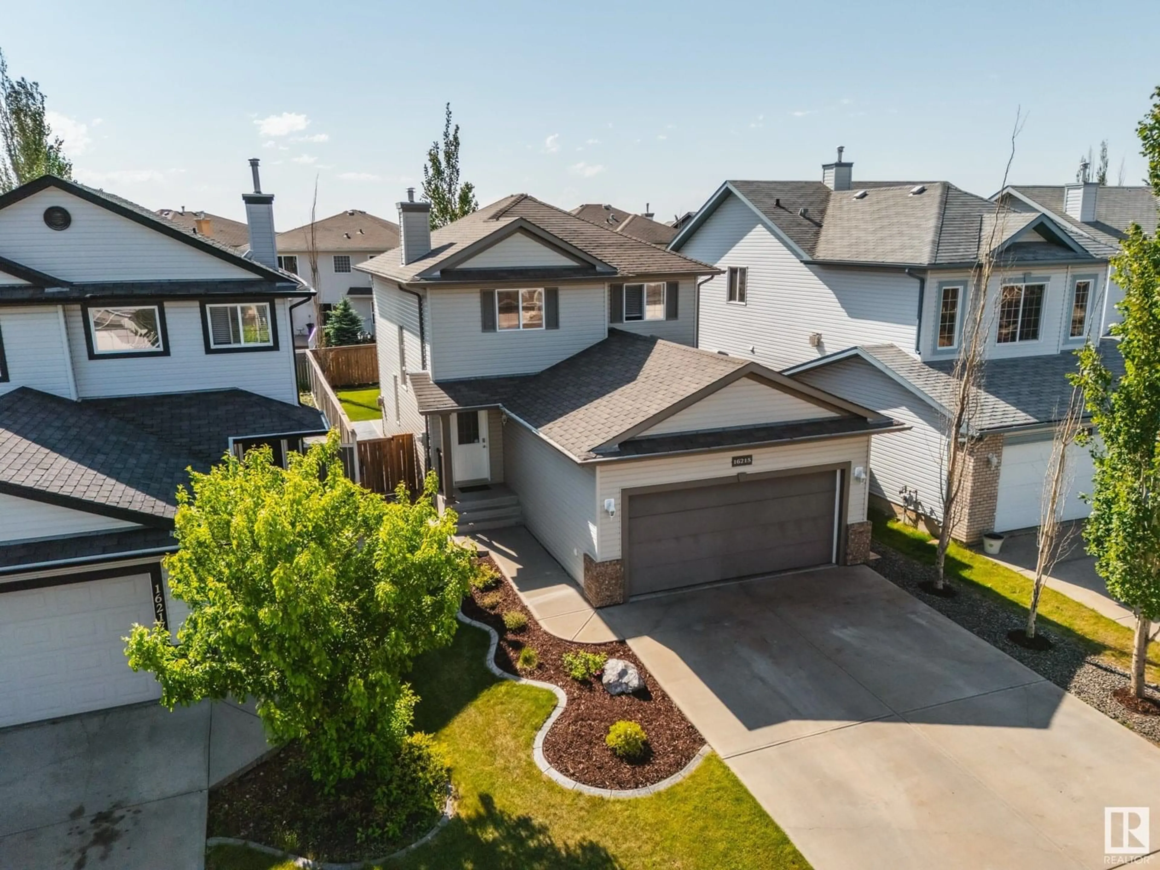 A pic from outside/outdoor area/front of a property/back of a property/a pic from drone, street for 16215 47 ST, Edmonton Alberta T5Y3M4