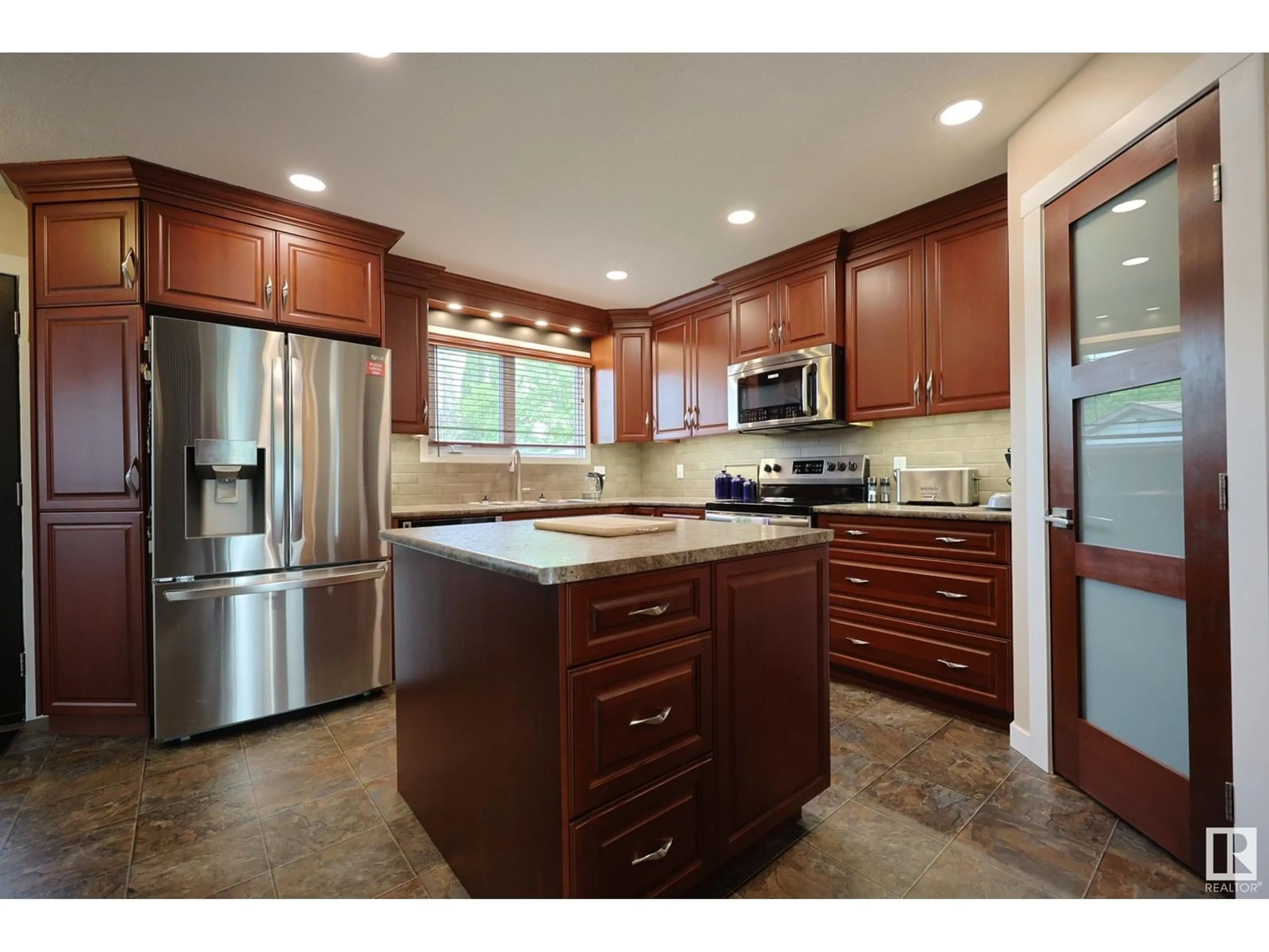 Open concept kitchen, ceramic/tile floor for NW - 1161 75 ST, Edmonton Alberta T6K2S4