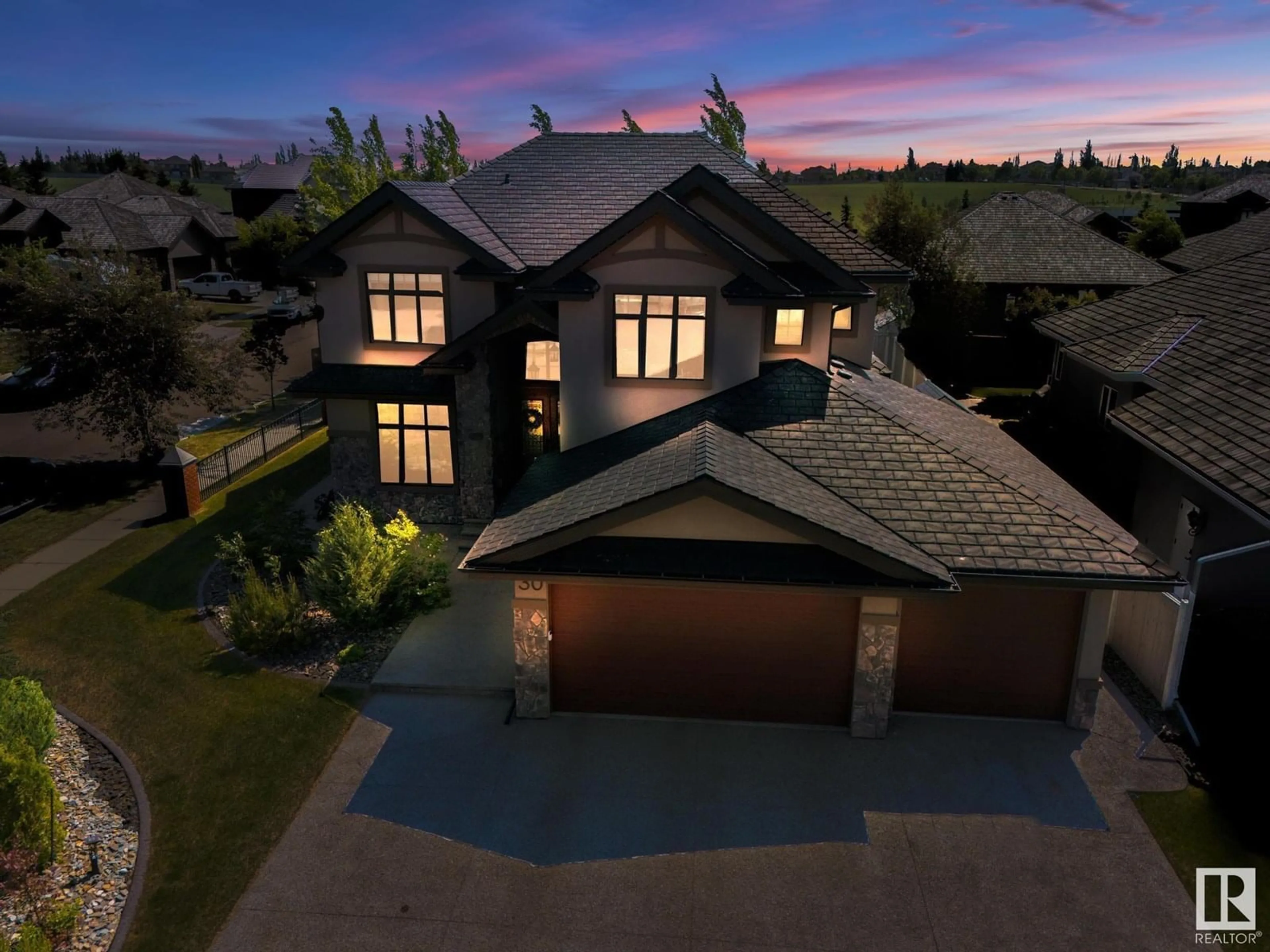 A pic from outside/outdoor area/front of a property/back of a property/a pic from drone, street for 30 KINGSMEADE CR, St. Albert Alberta T8N4C8