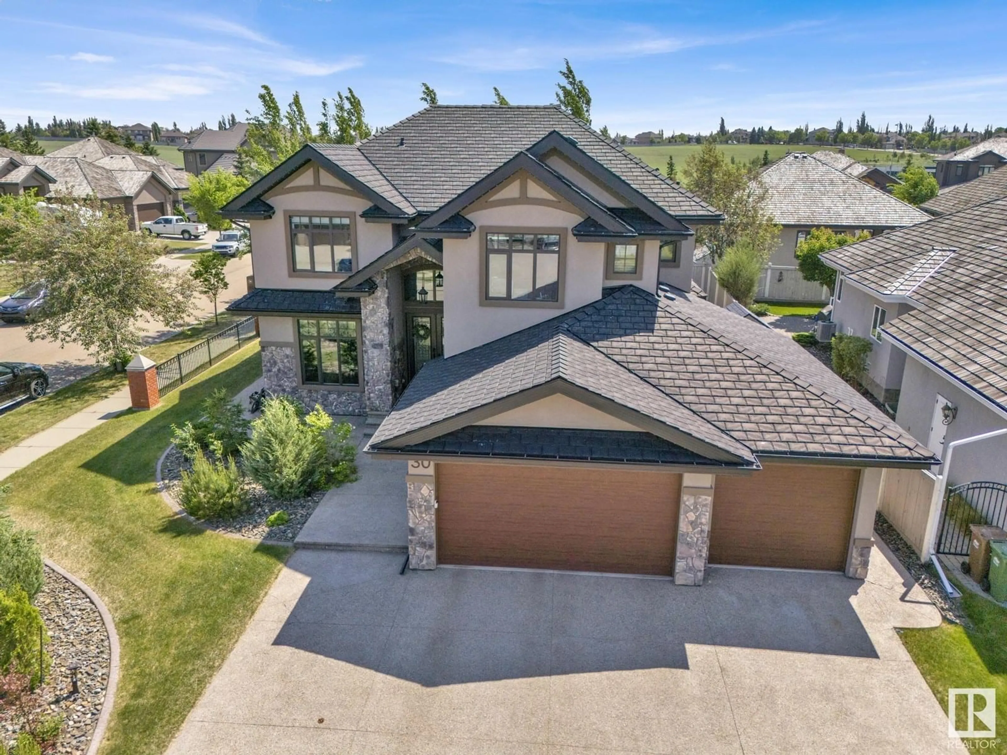 A pic from outside/outdoor area/front of a property/back of a property/a pic from drone, street for 30 KINGSMEADE CR, St. Albert Alberta T8N4C8