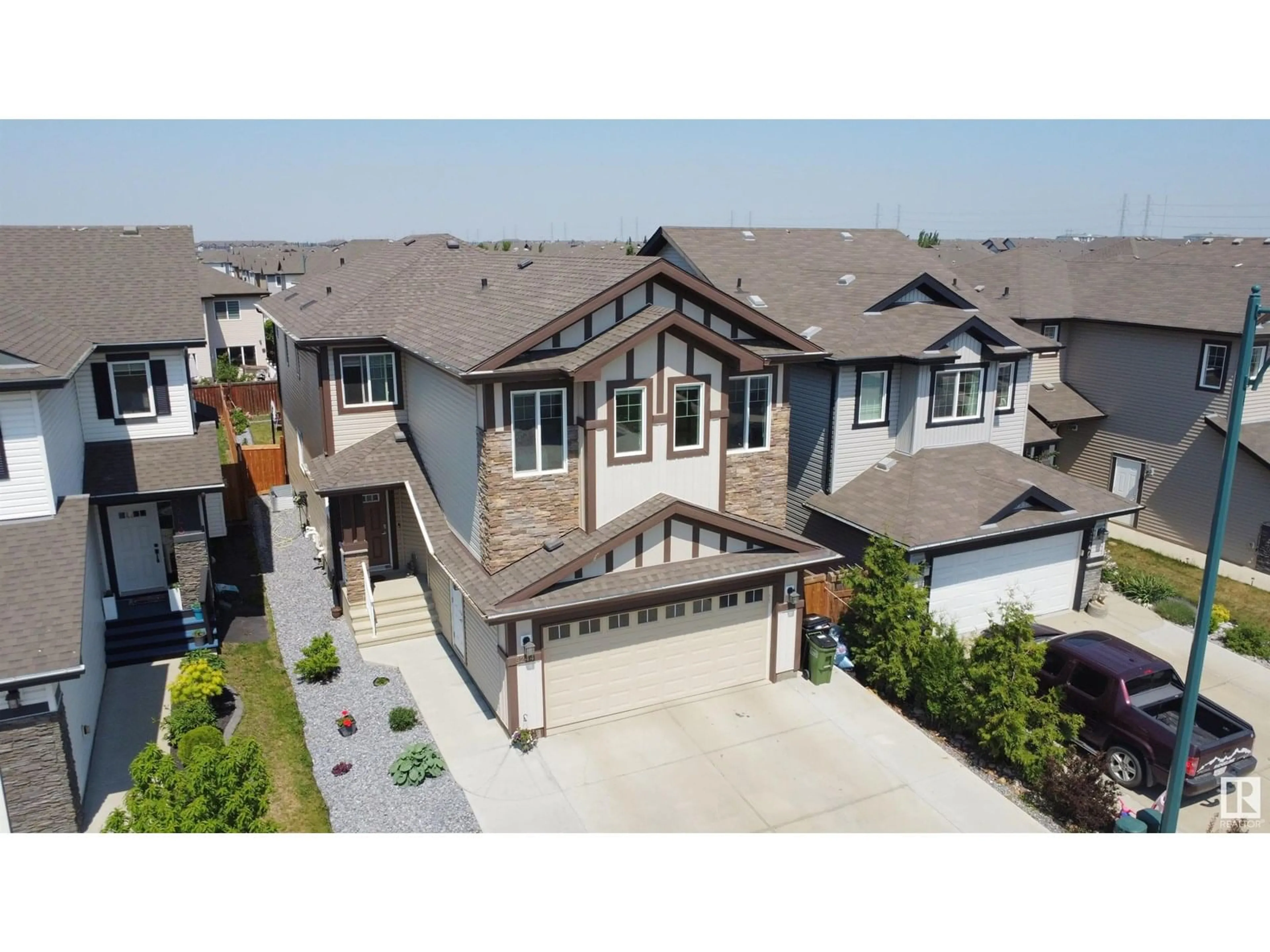 A pic from outside/outdoor area/front of a property/back of a property/a pic from drone, street for NW - 3244 13 AVE AV, Edmonton Alberta T6T0Z4