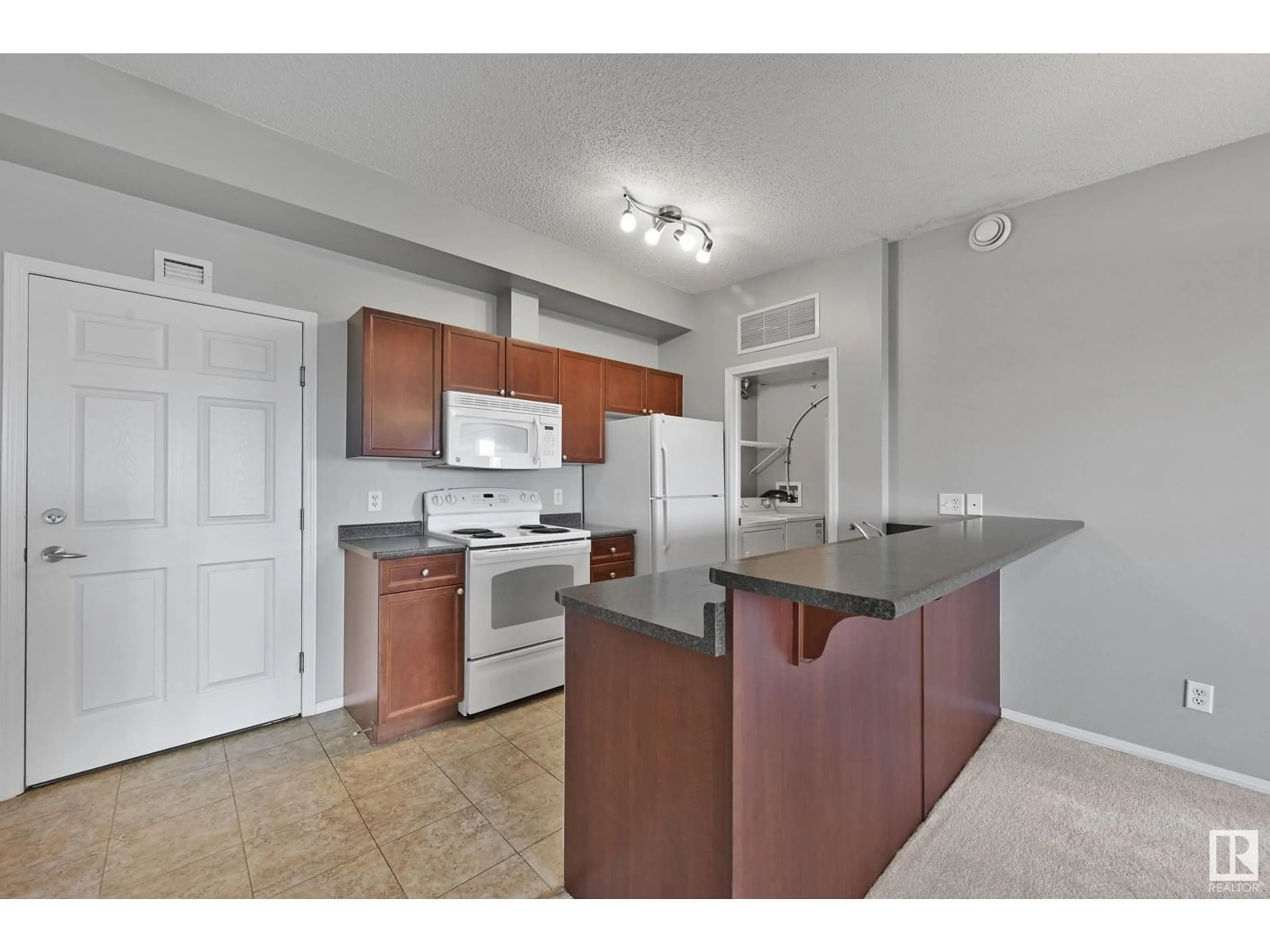 Standard kitchen, unknown for #409 - 6921 199 ST NW, Edmonton Alberta T6M2N8