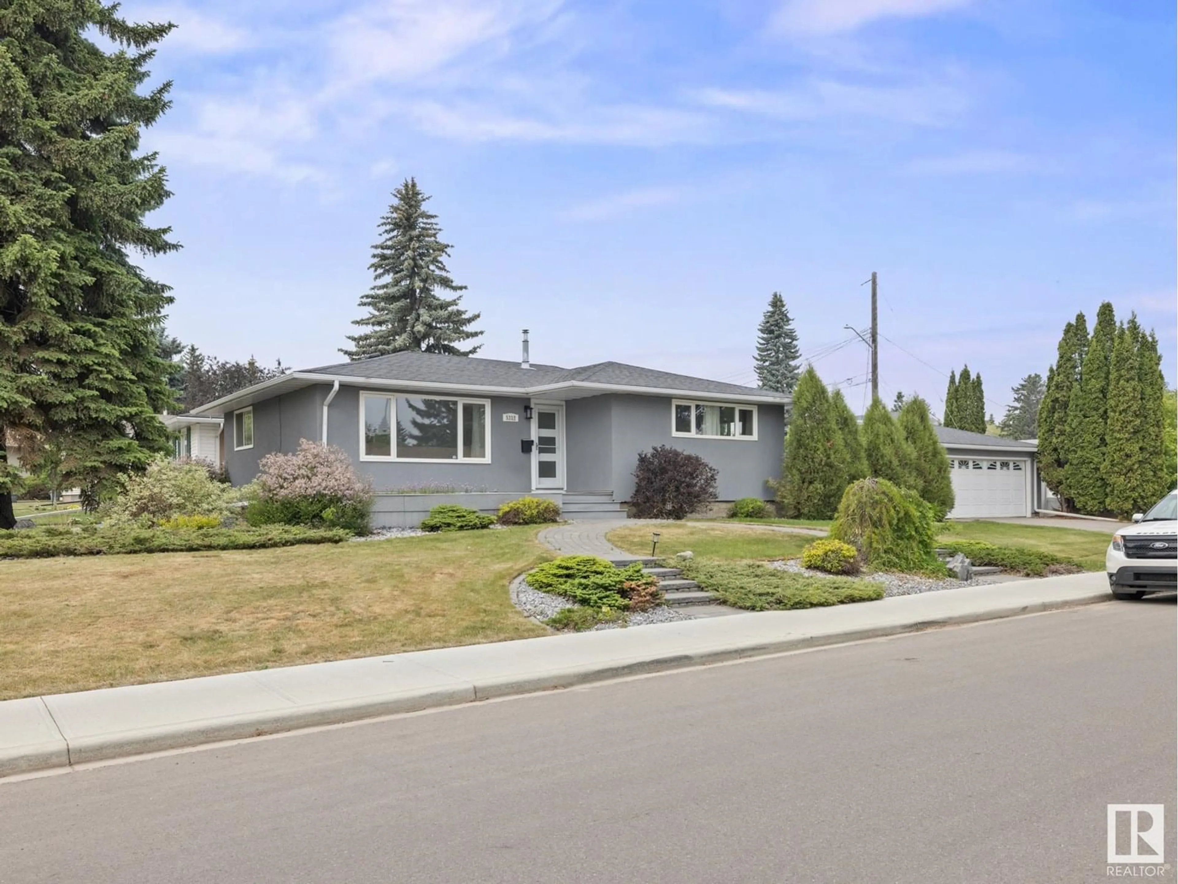 Home with vinyl exterior material, street for 5312 105 ST, Edmonton Alberta T6H2M9