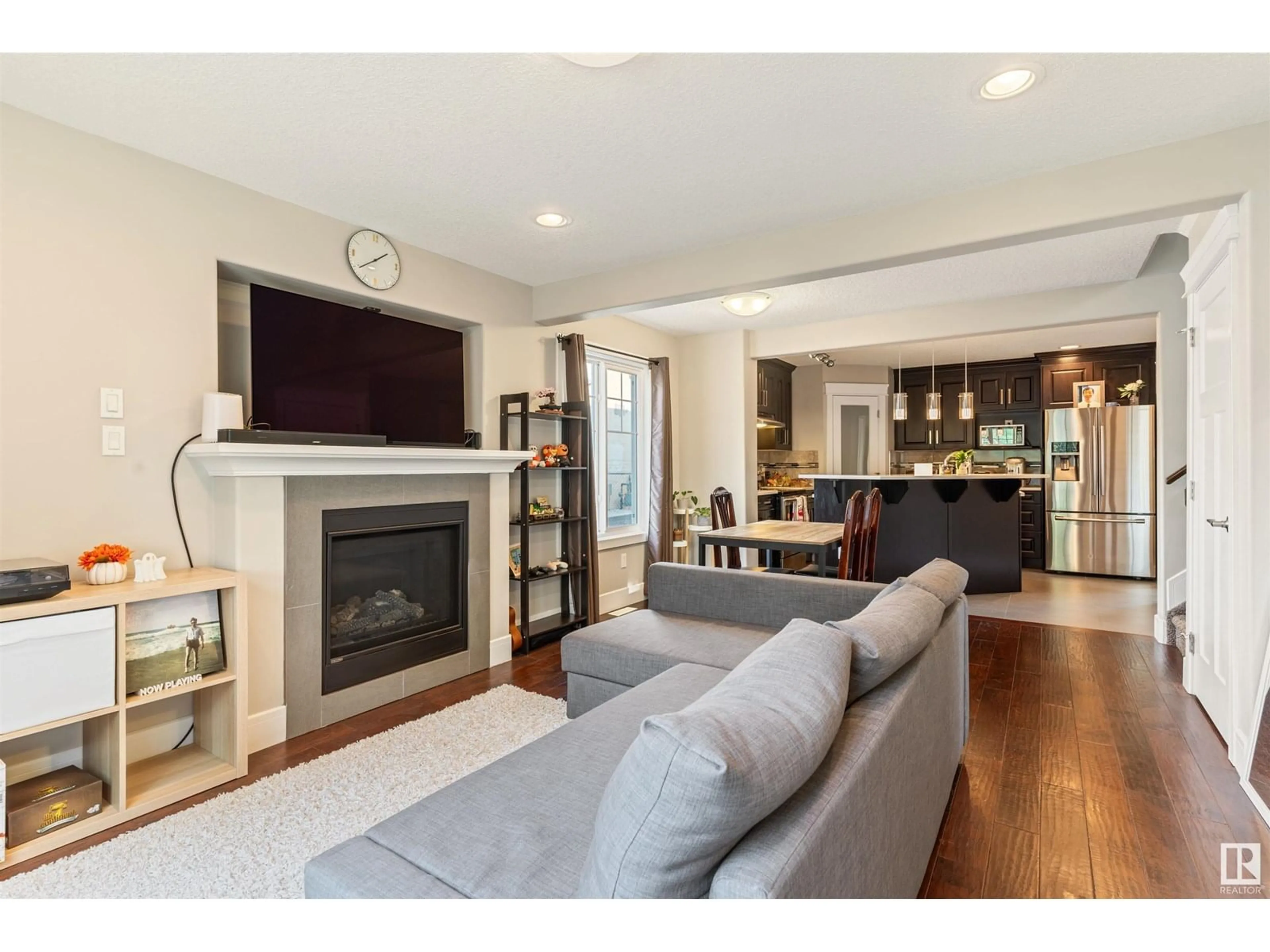 Living room with furniture, wood/laminate floor for 10917 71 AVE, Edmonton Alberta T6G0A2