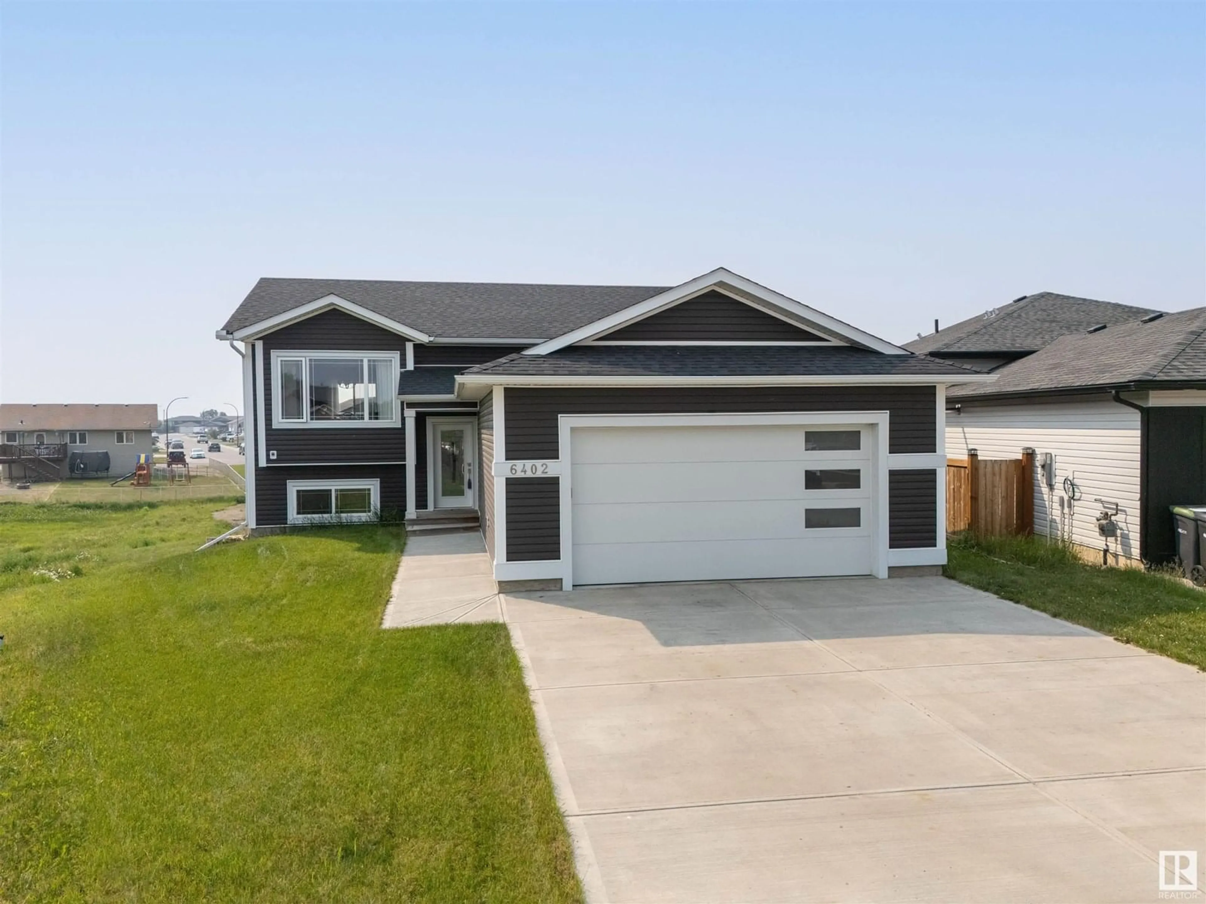 Home with vinyl exterior material, street for 6402 45 ST, Cold Lake Alberta T9M0B5