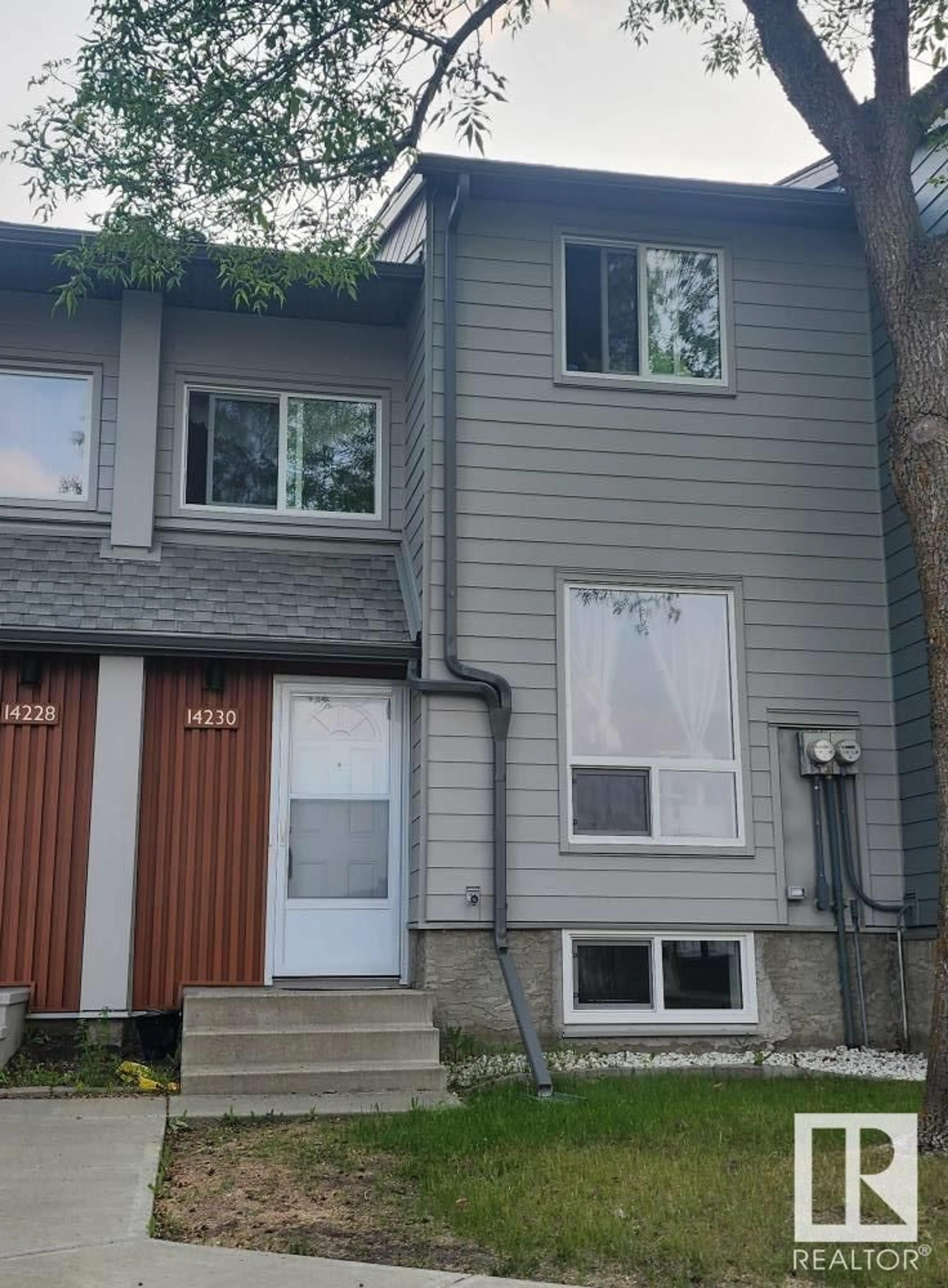 Home with vinyl exterior material, street for NW - 14230 31 ST, Edmonton Alberta T5Y1H1