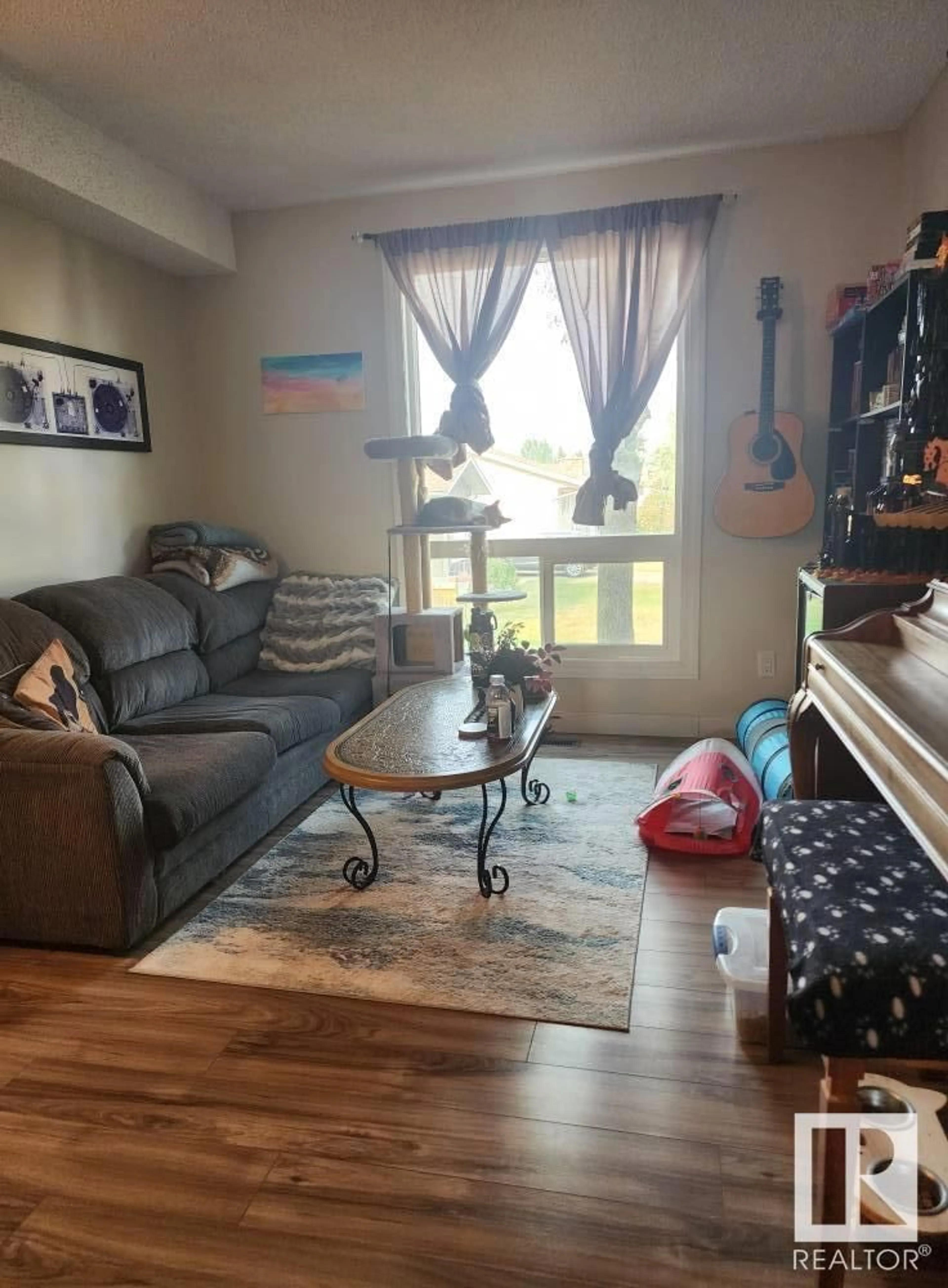 Living room with furniture, unknown for NW - 14230 31 ST, Edmonton Alberta T5Y1H1