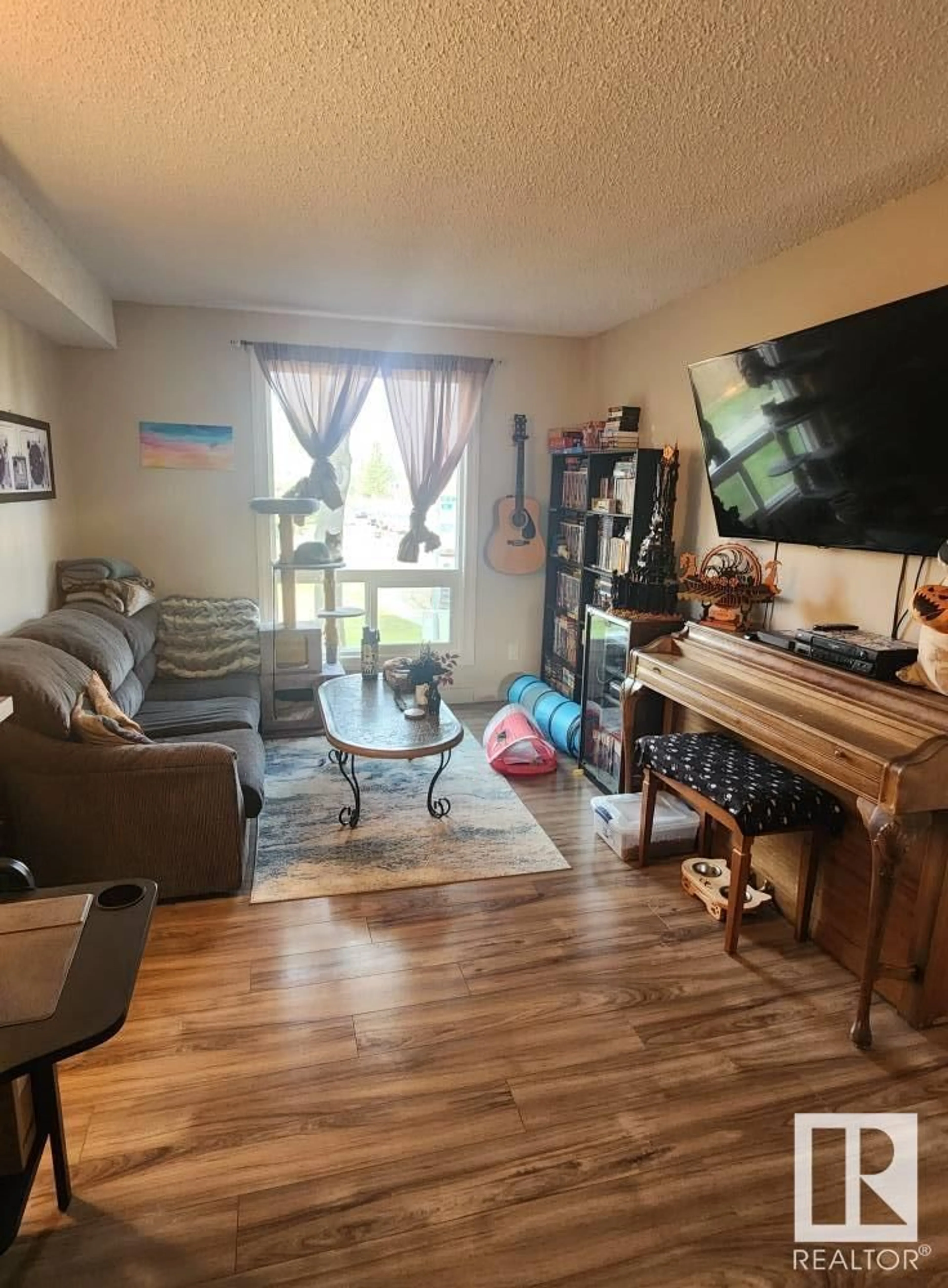 Living room with furniture, unknown for NW - 14230 31 ST, Edmonton Alberta T5Y1H1