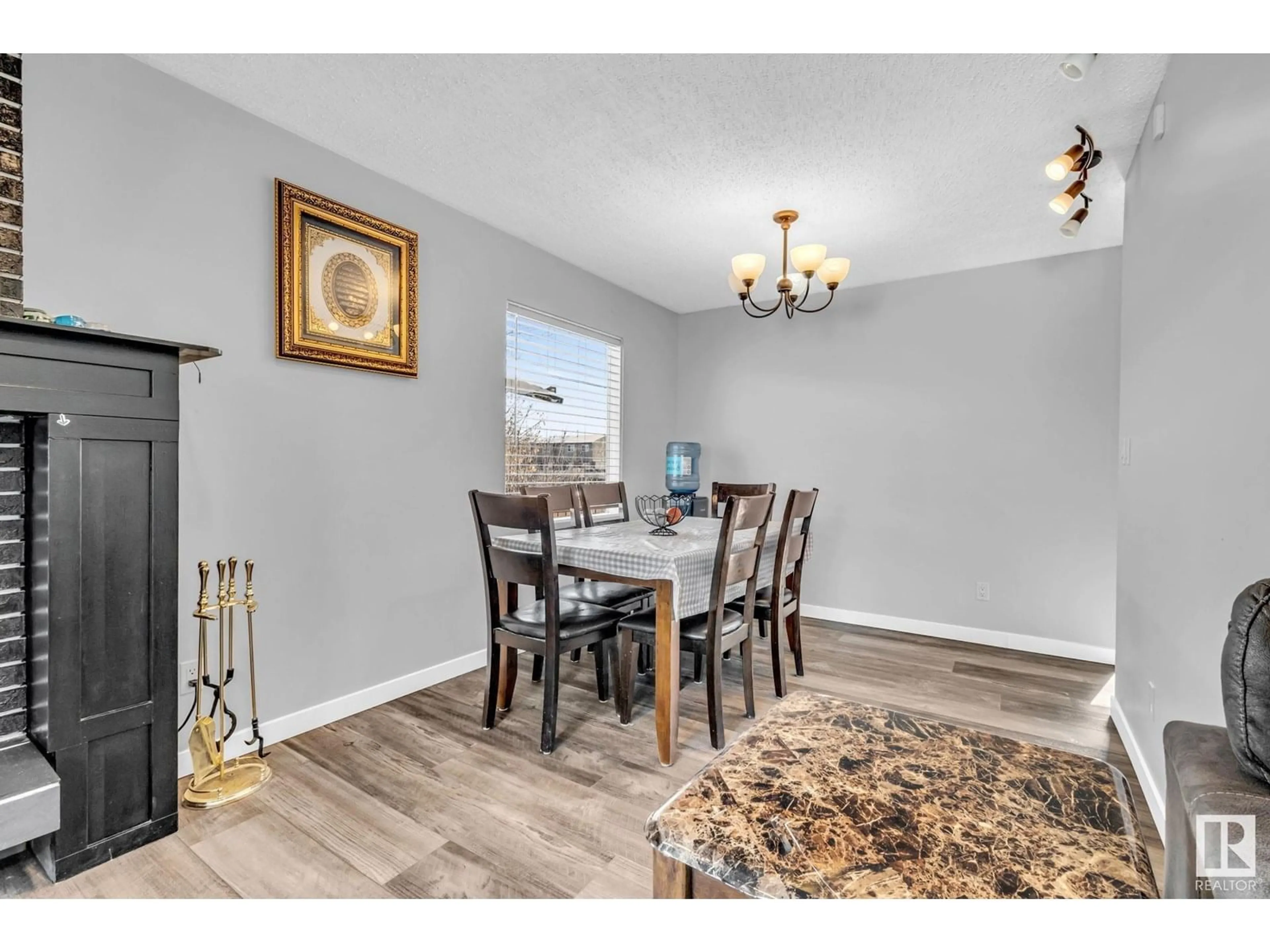 Dining room, wood/laminate floor for NW - 12135 152A AV, Edmonton Alberta T5X1R1