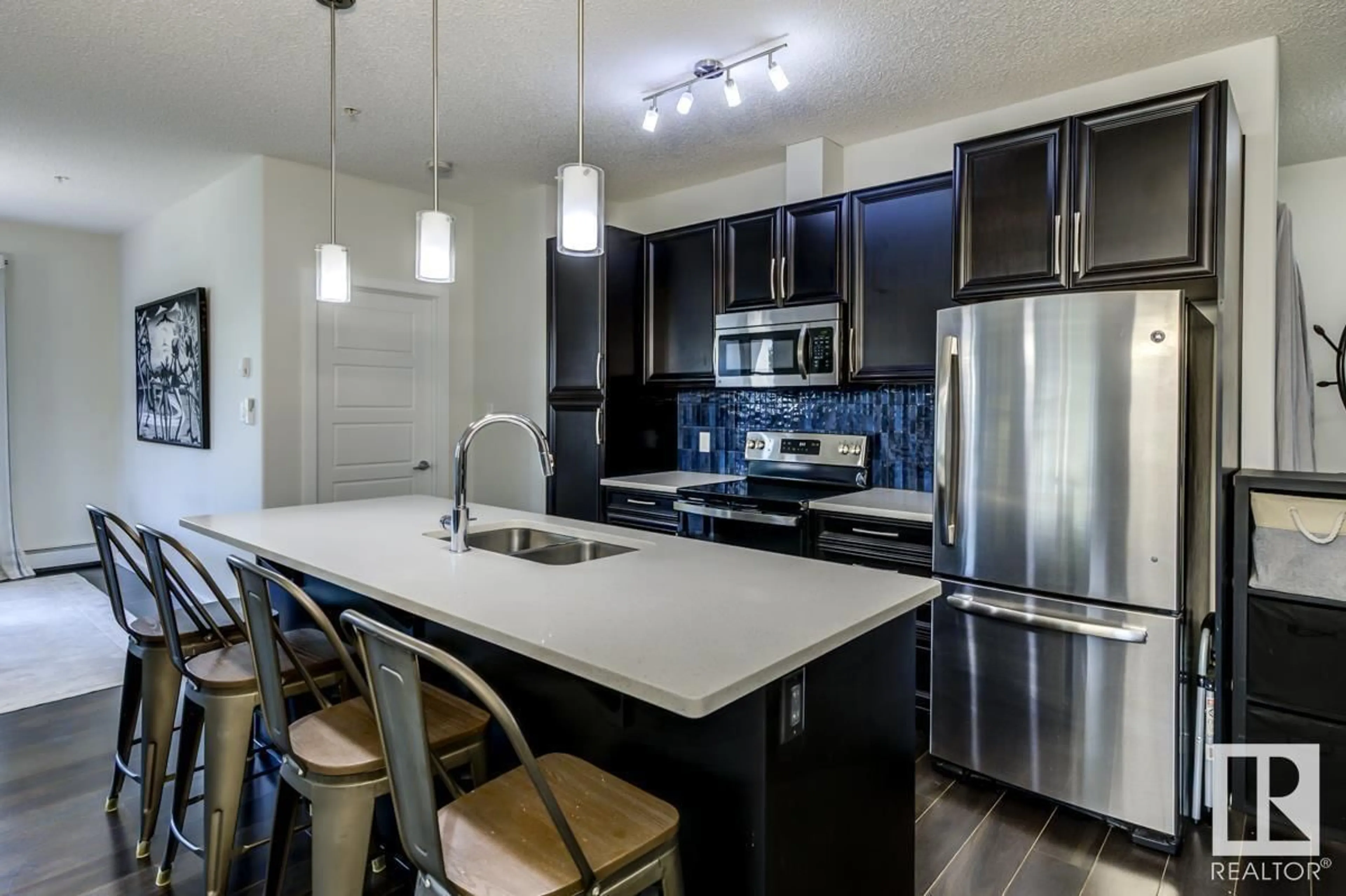 Open concept kitchen, unknown for #111 - 1144 ADAMSON DR, Edmonton Alberta T6W2X7
