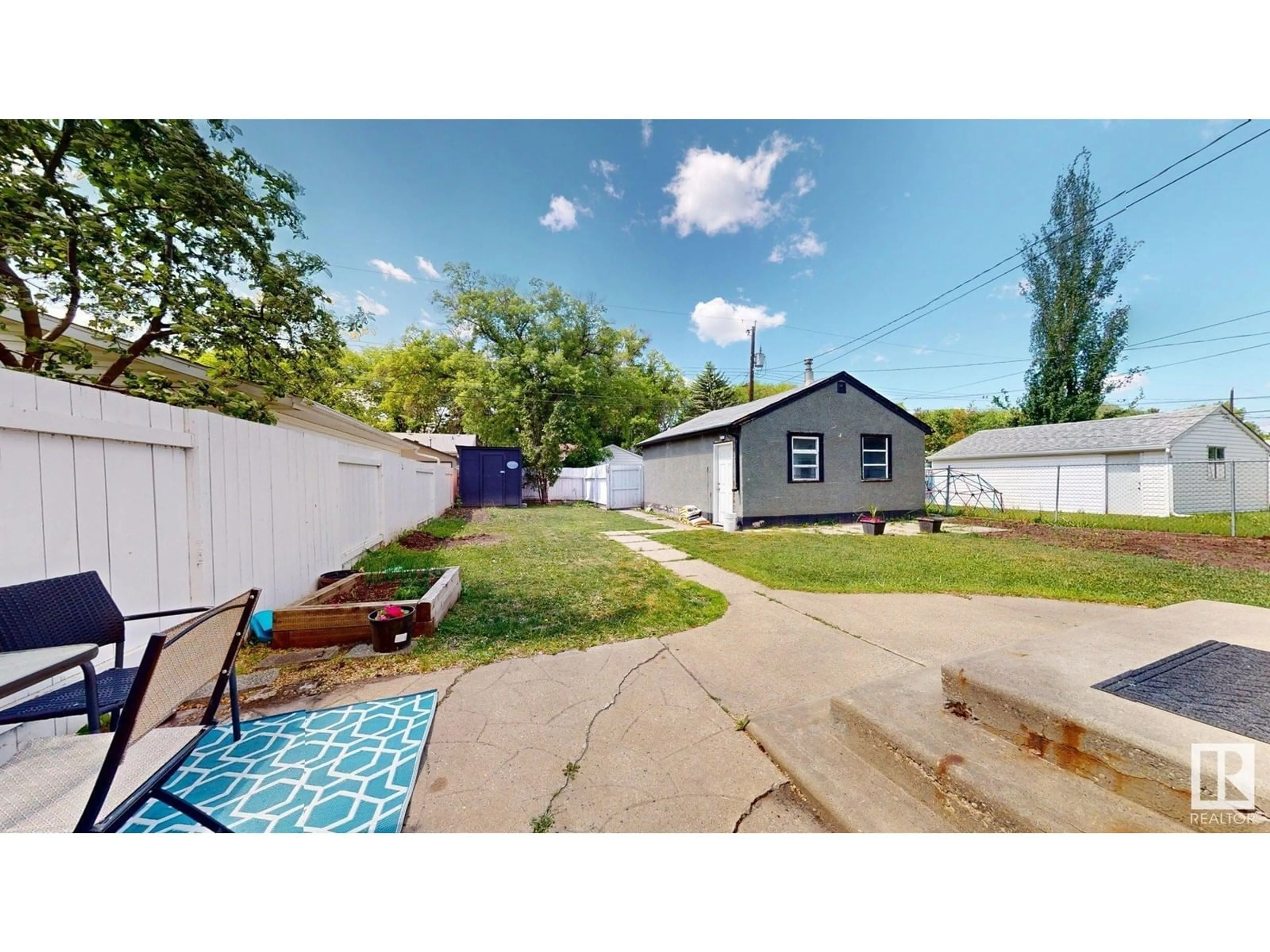 A pic from outside/outdoor area/front of a property/back of a property/a pic from drone, street for 11924 51 ST, Edmonton Alberta T5W3G4