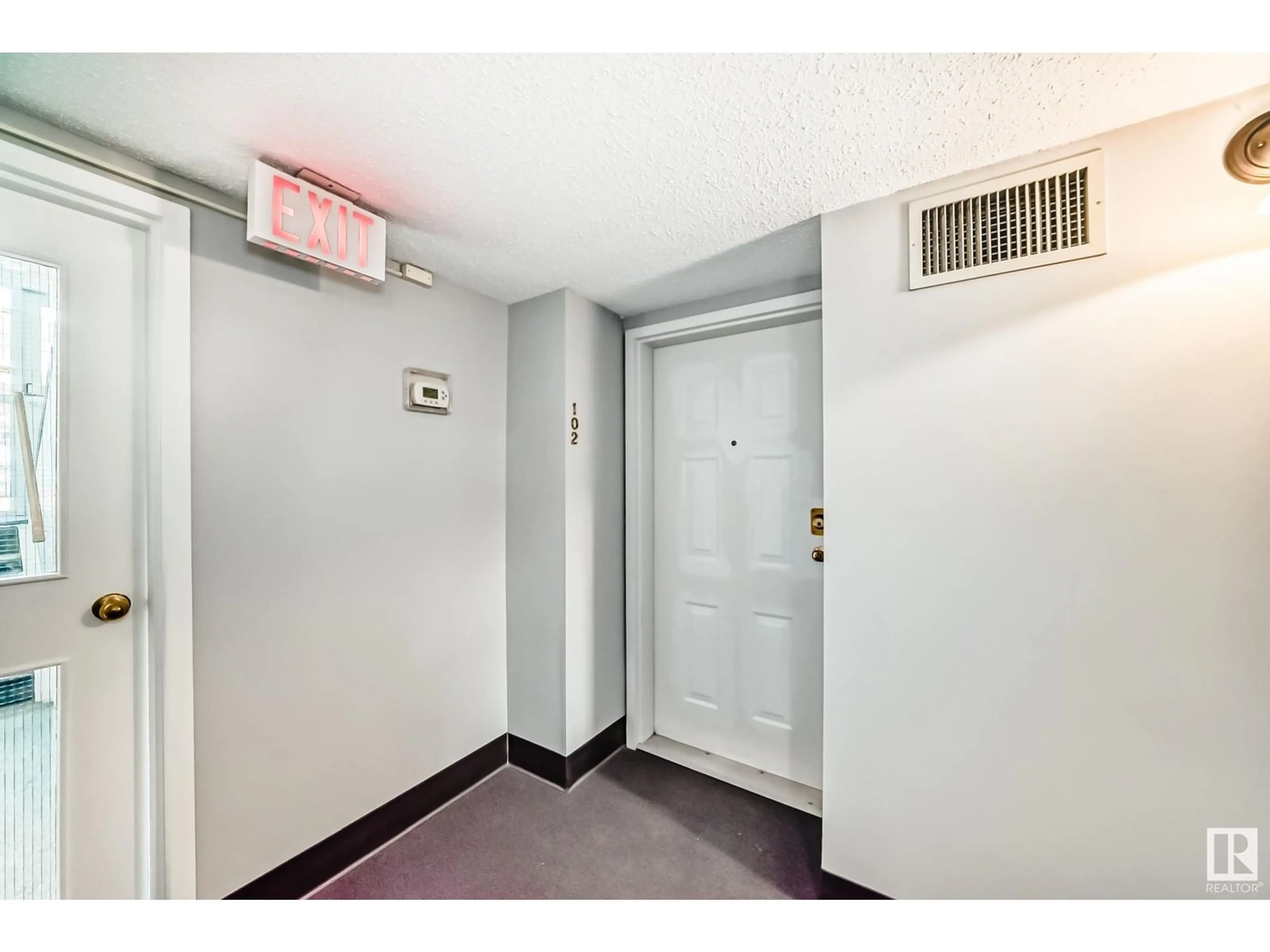 Indoor foyer for #102 - 11045 123 ST, Edmonton Alberta T5M0E4