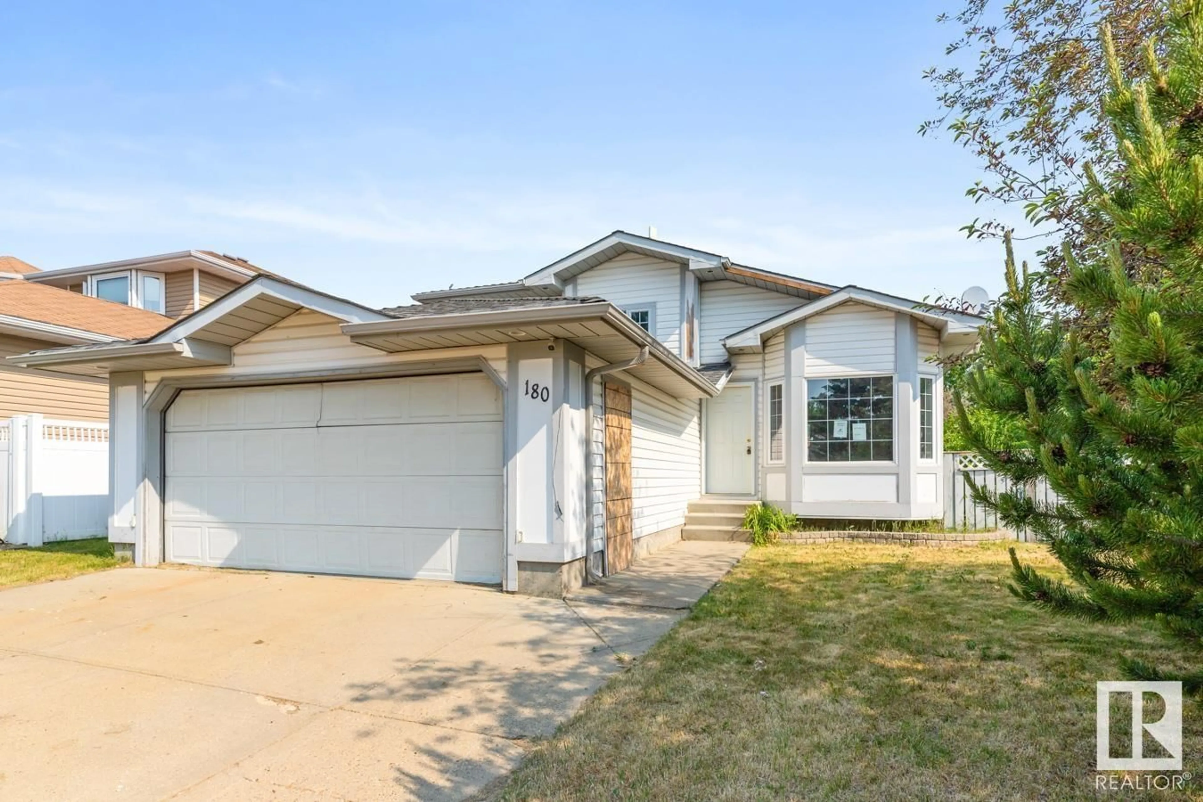 Home with vinyl exterior material, street for 180 WEST LIBERTY CR, Millet Alberta T0C1Z0
