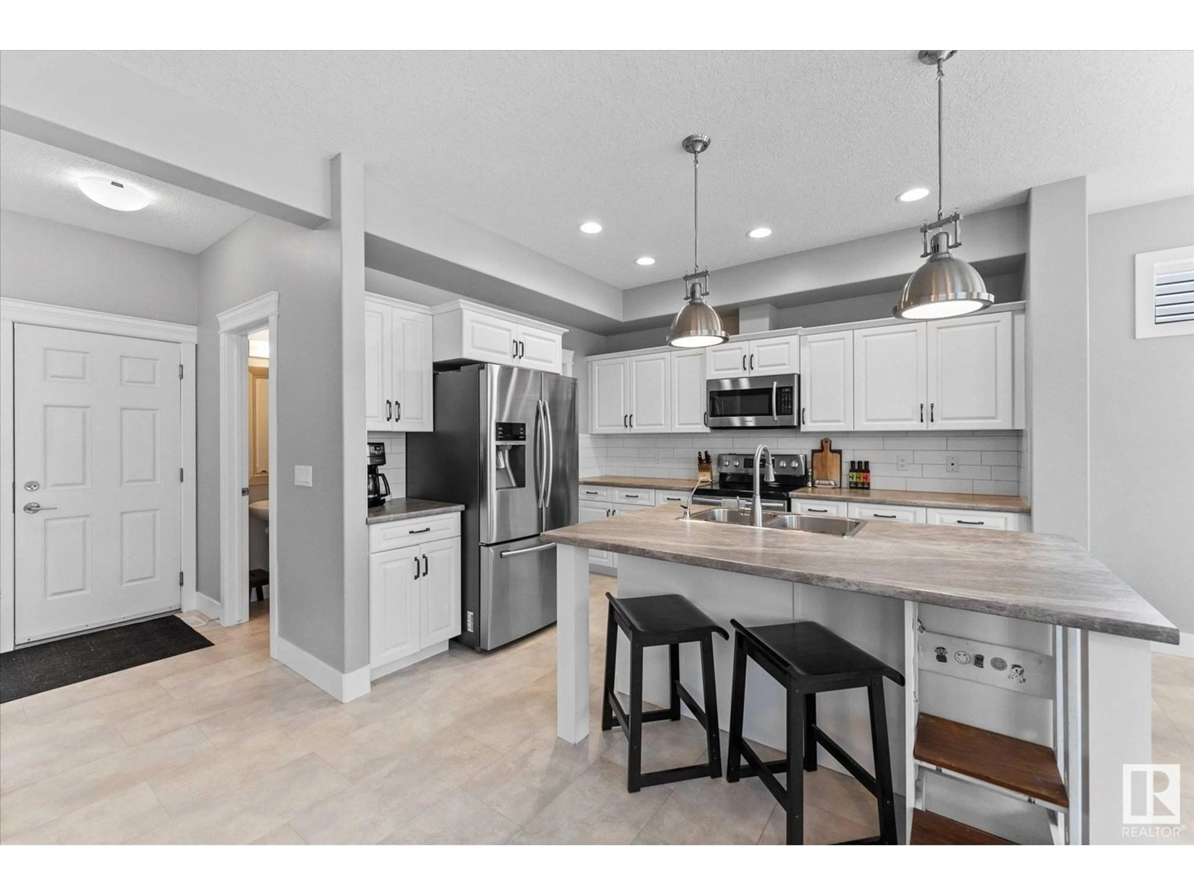 Open concept kitchen, ceramic/tile floor for 166 HARVEST RIDGE DR, Spruce Grove Alberta T7X0P4