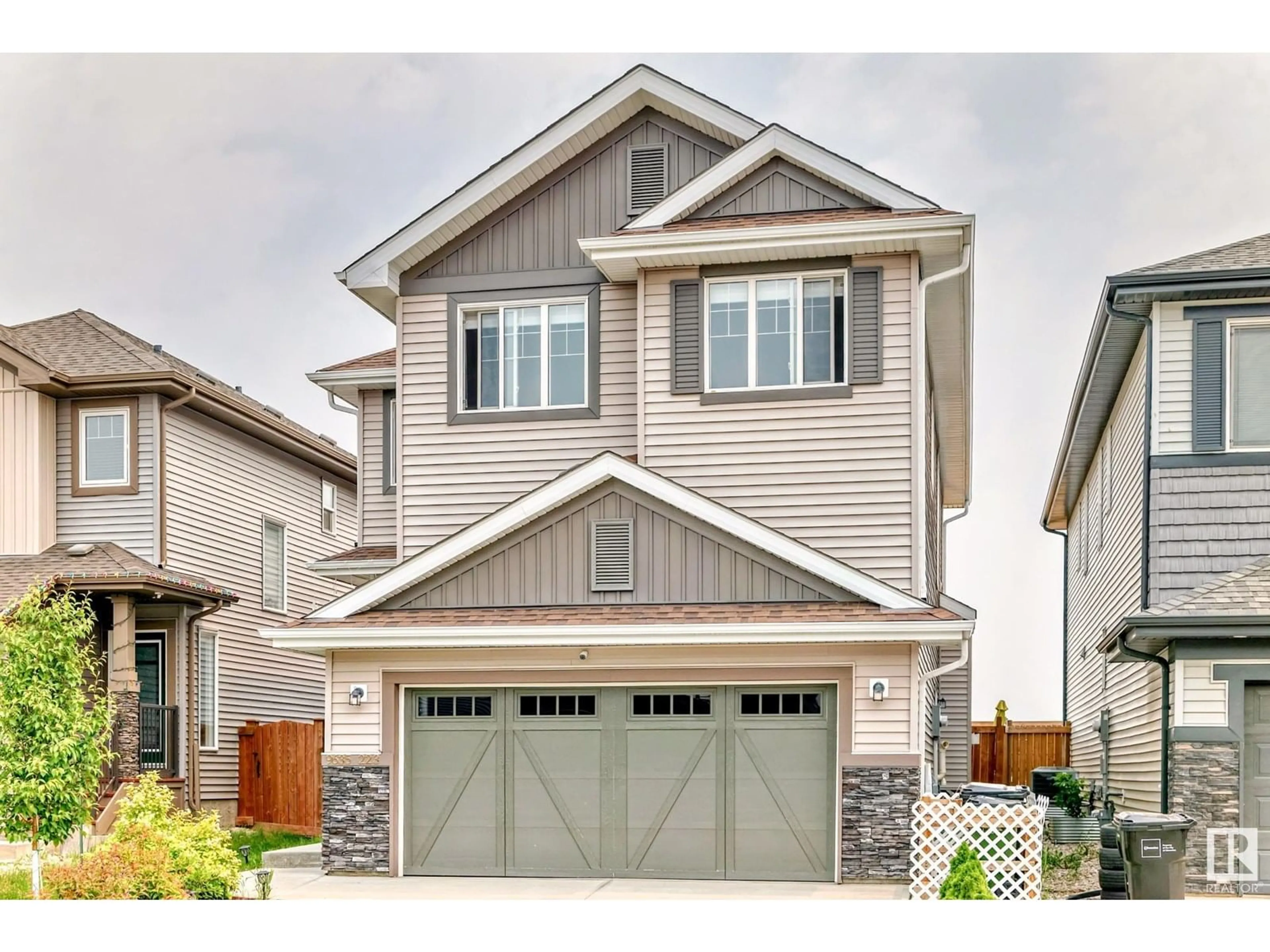 Home with vinyl exterior material, street for NW - 9635 223 ST, Edmonton Alberta T5T7B7